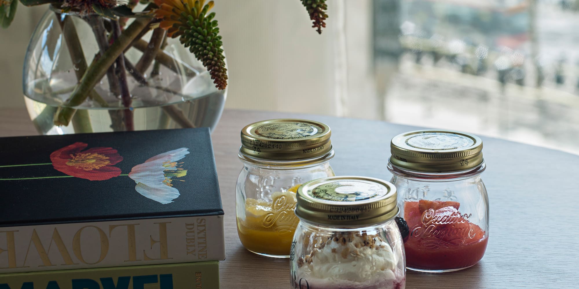 a group of jars with food on a table