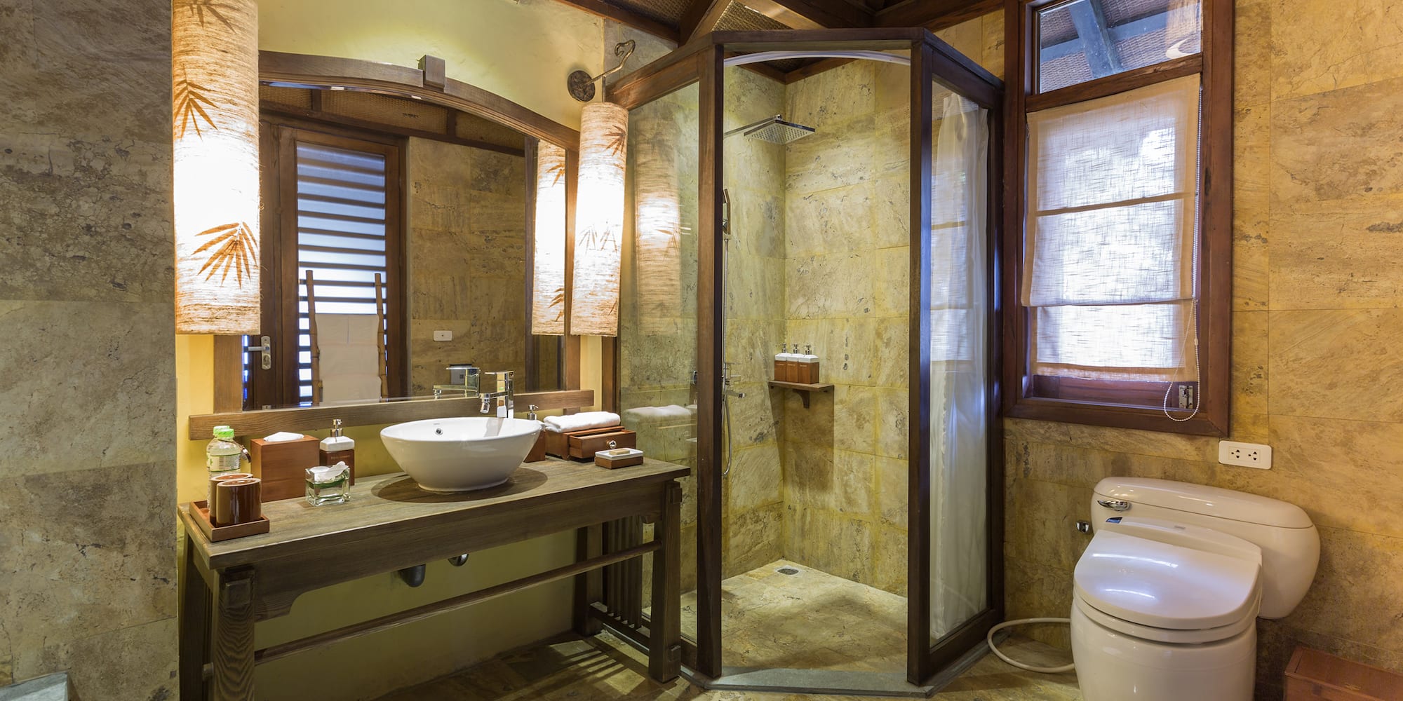 a bathroom with a shower and sink