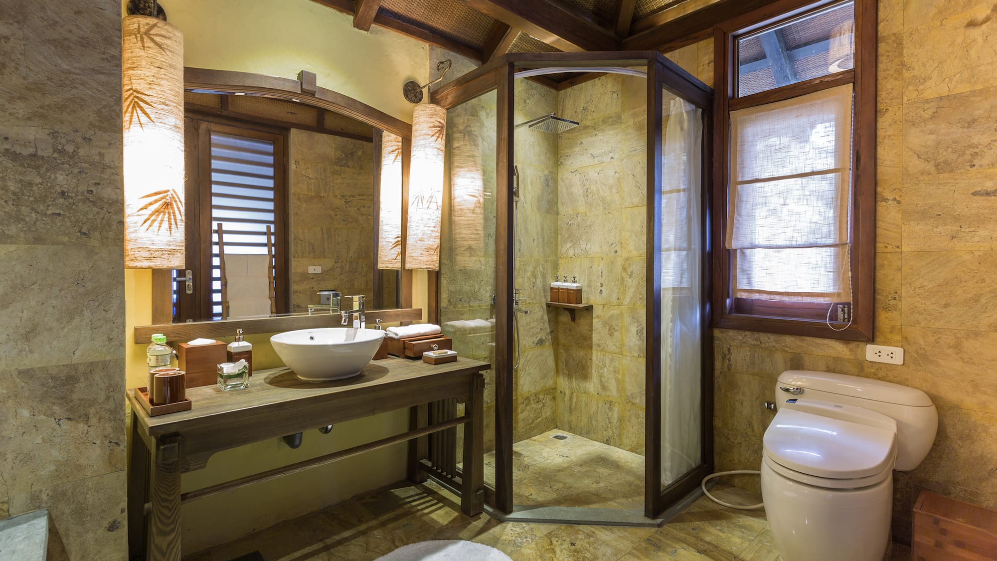 a bathroom with a shower and sink