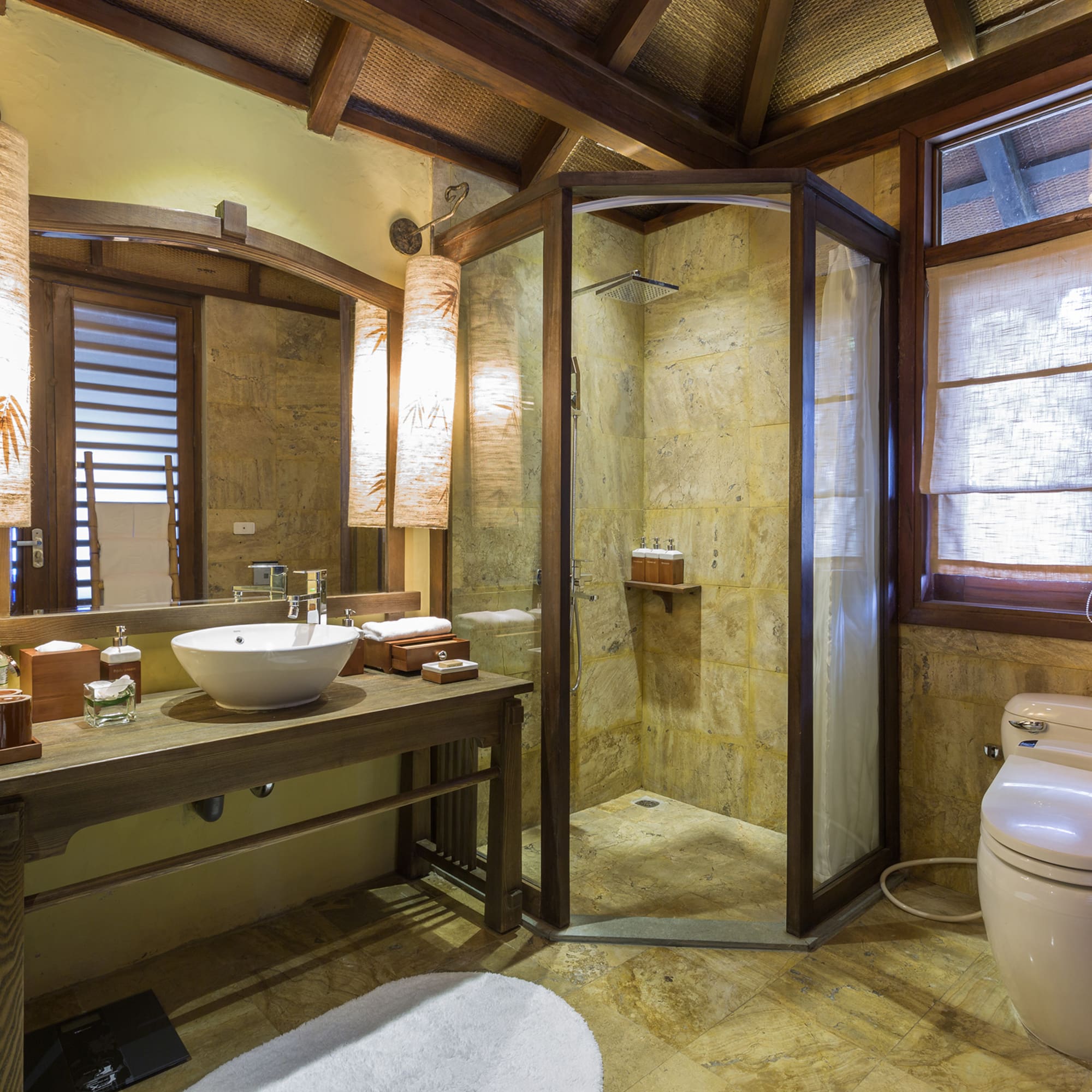 a bathroom with a shower and sink