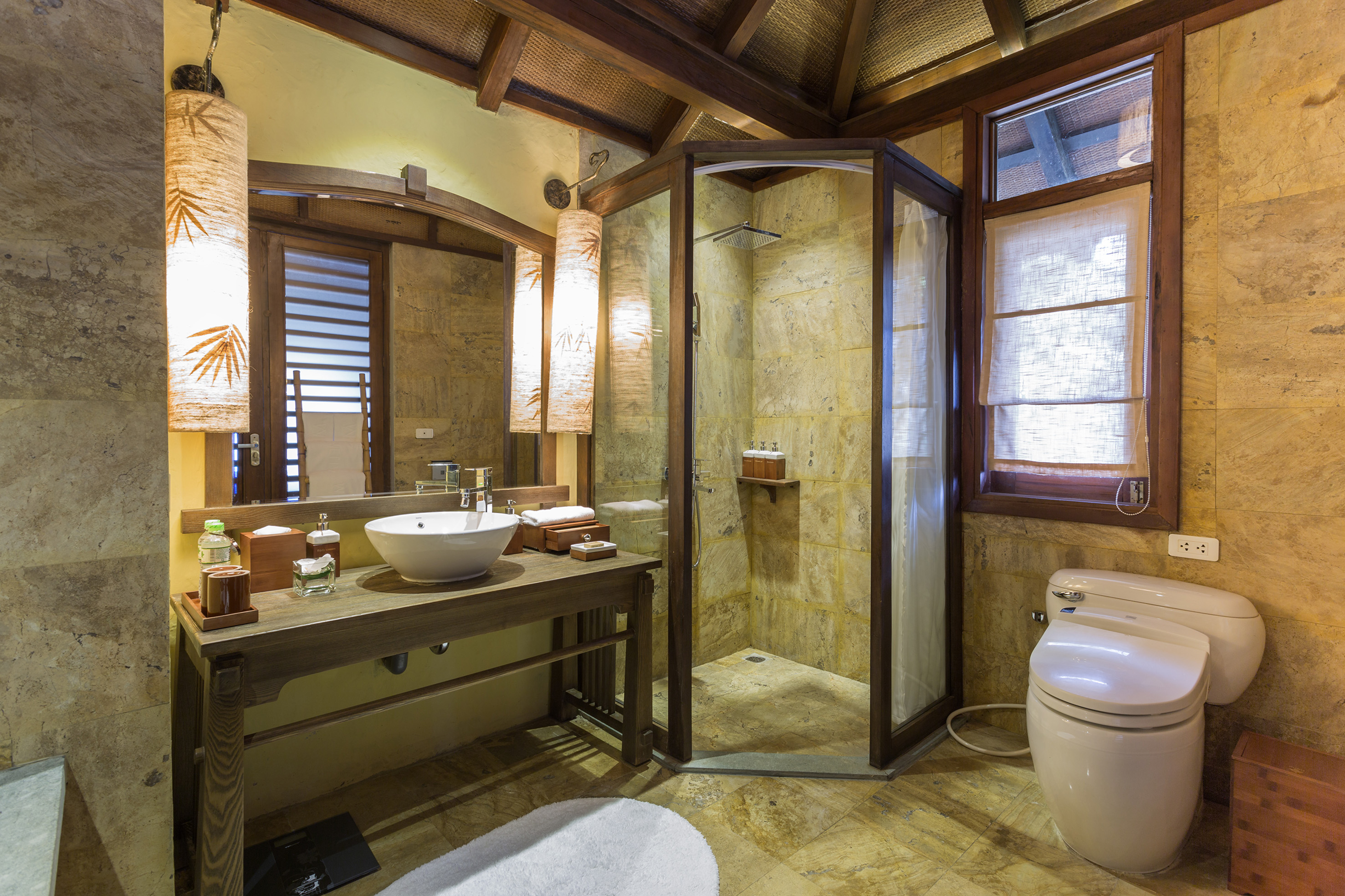 a bathroom with a shower and sink