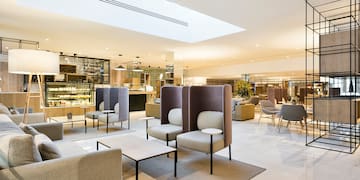 a room with chairs and tables