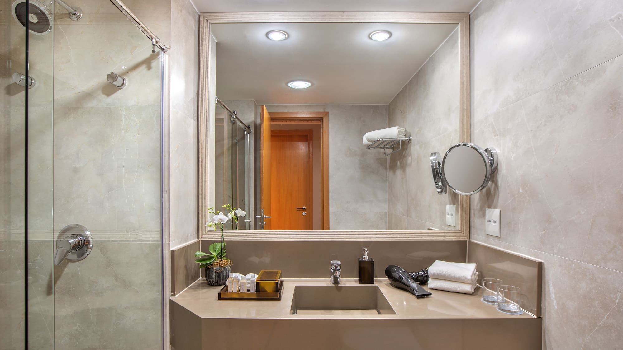 a bathroom with a mirror and sink