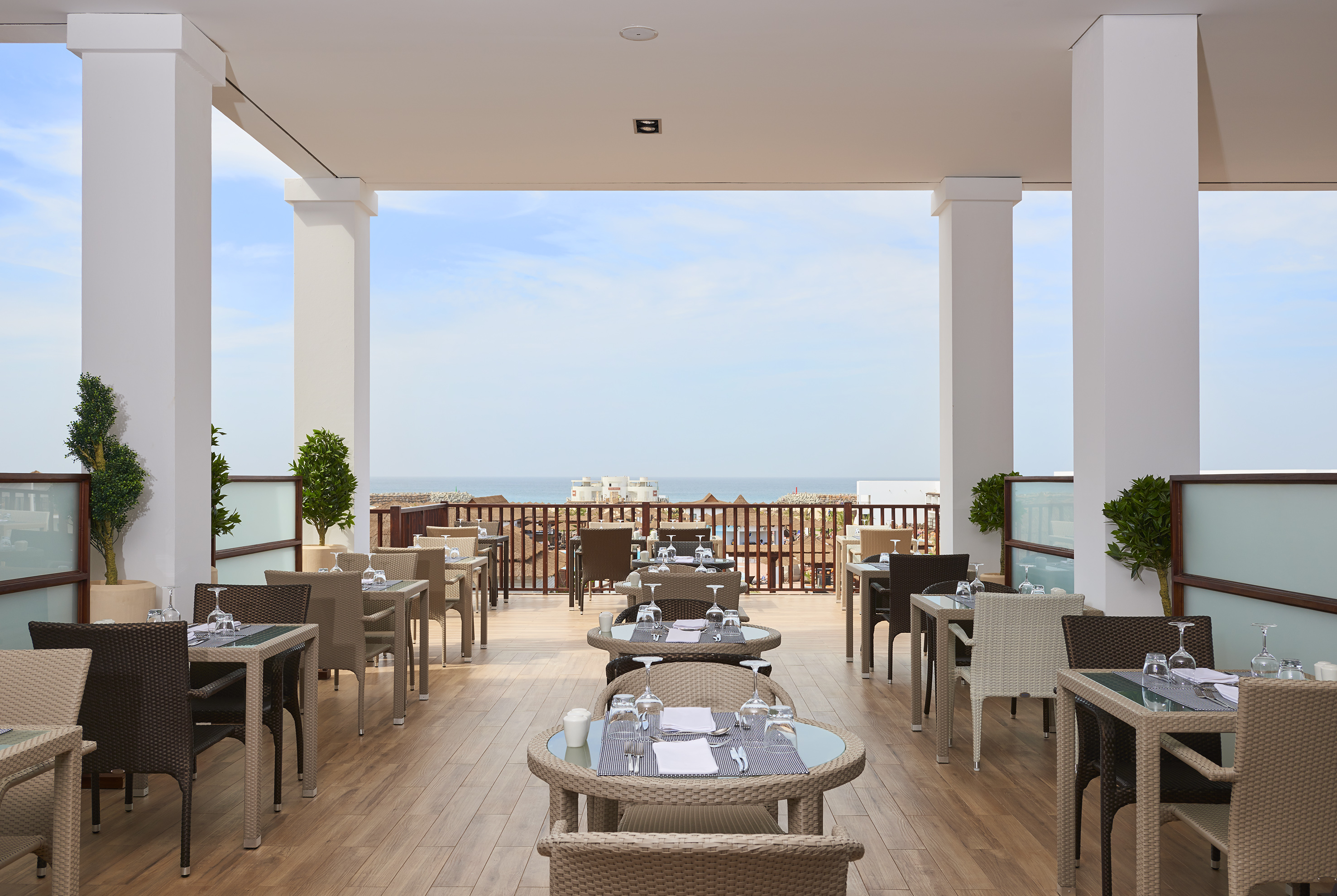 a restaurant with tables and chairs