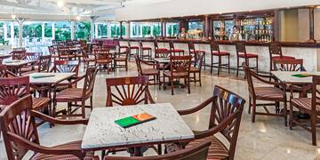 a room with tables and chairs