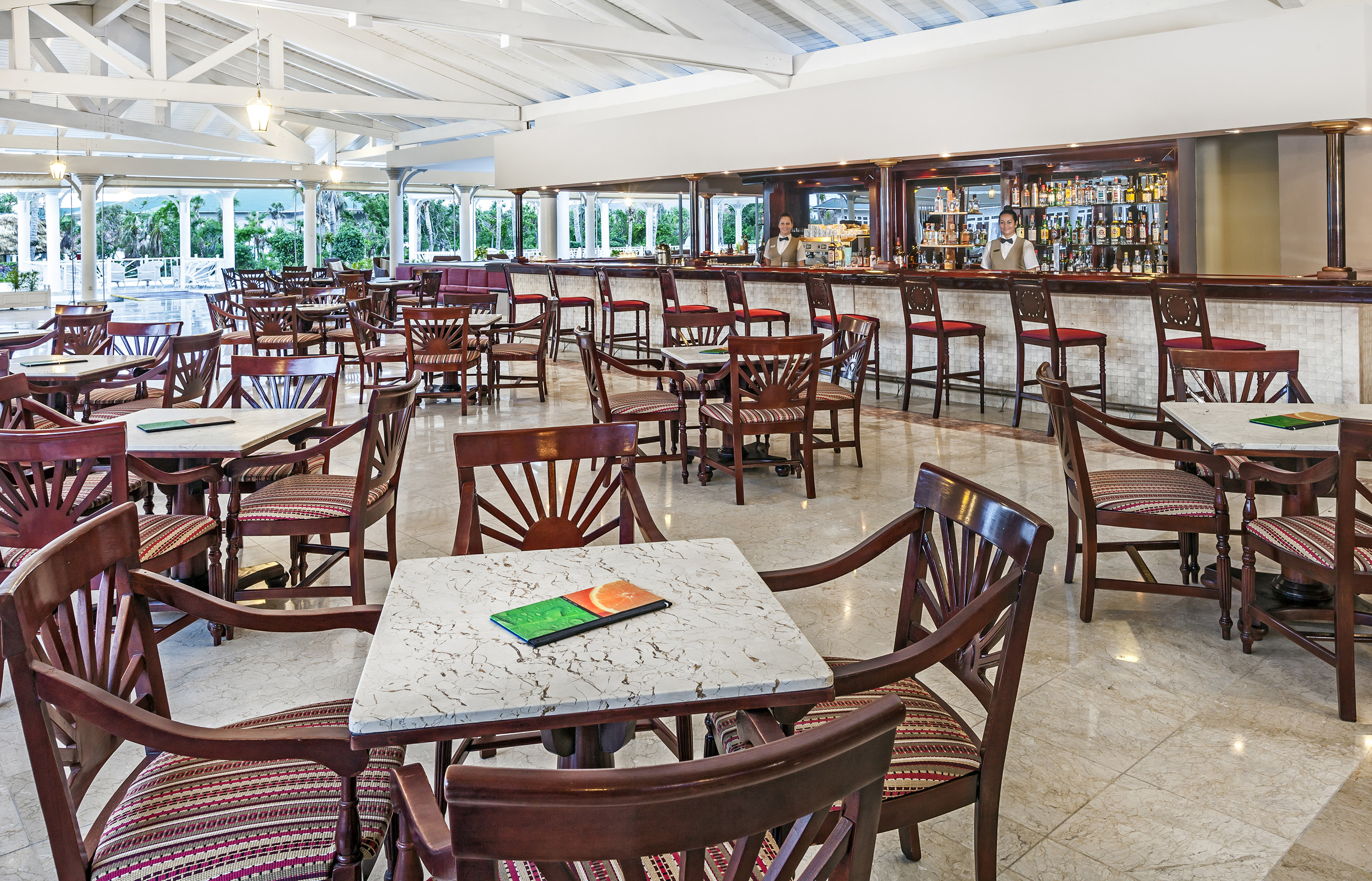 a room with tables and chairs