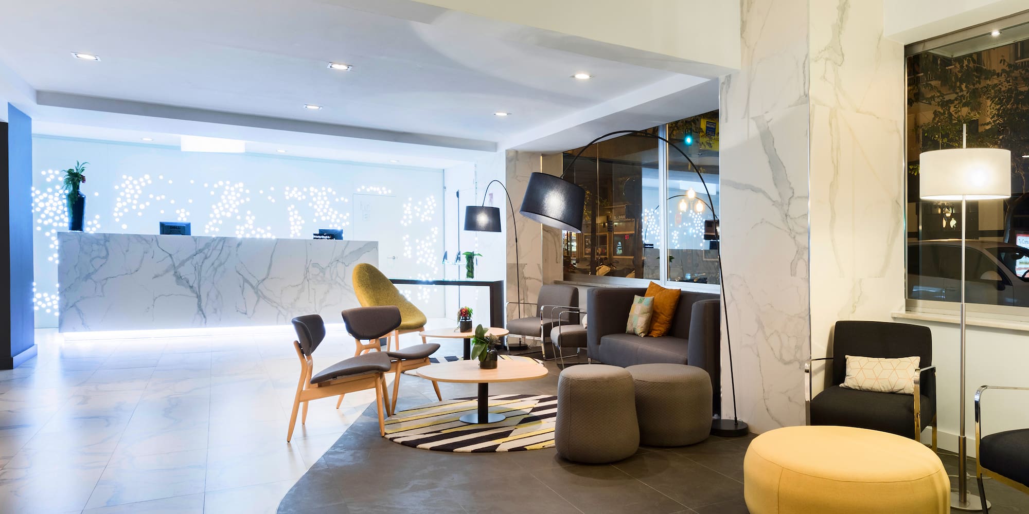 a room with a marble wall and a marble floor