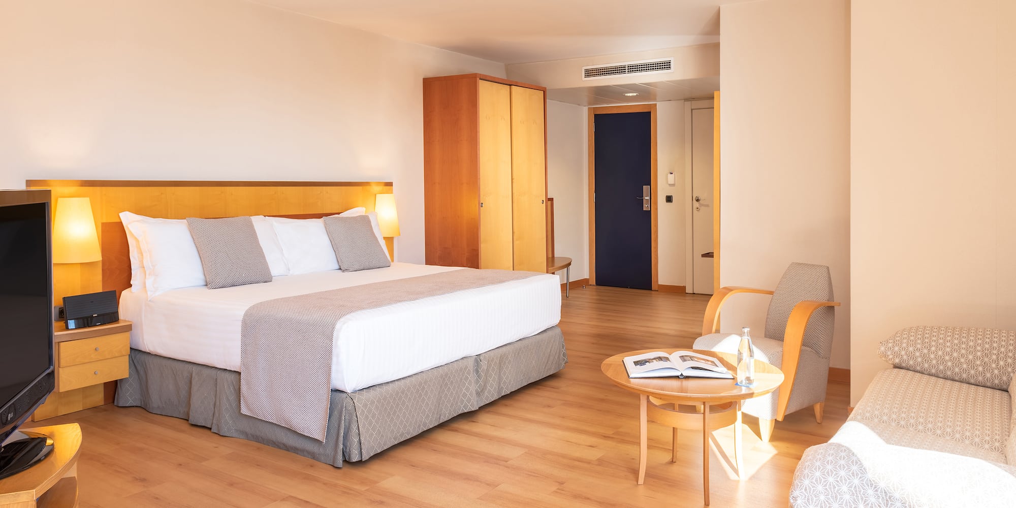 a room with a bed and a chair