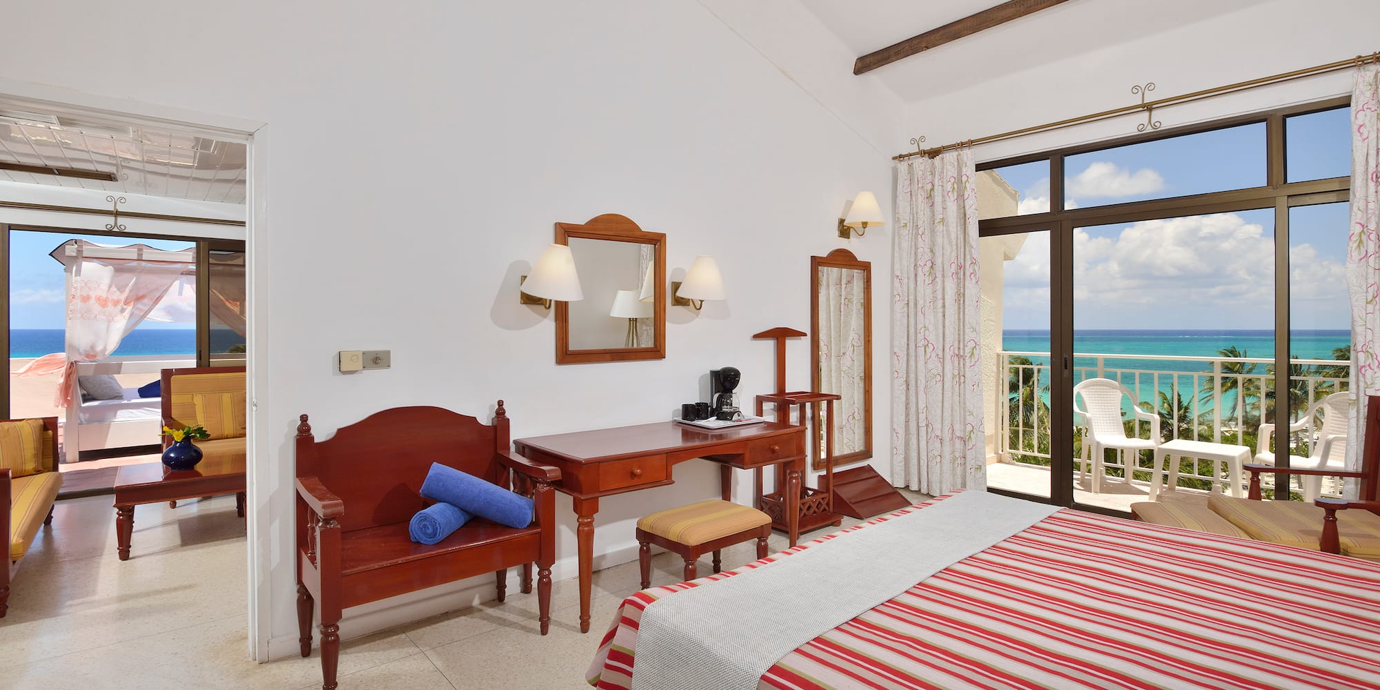 a room with a bed and a desk