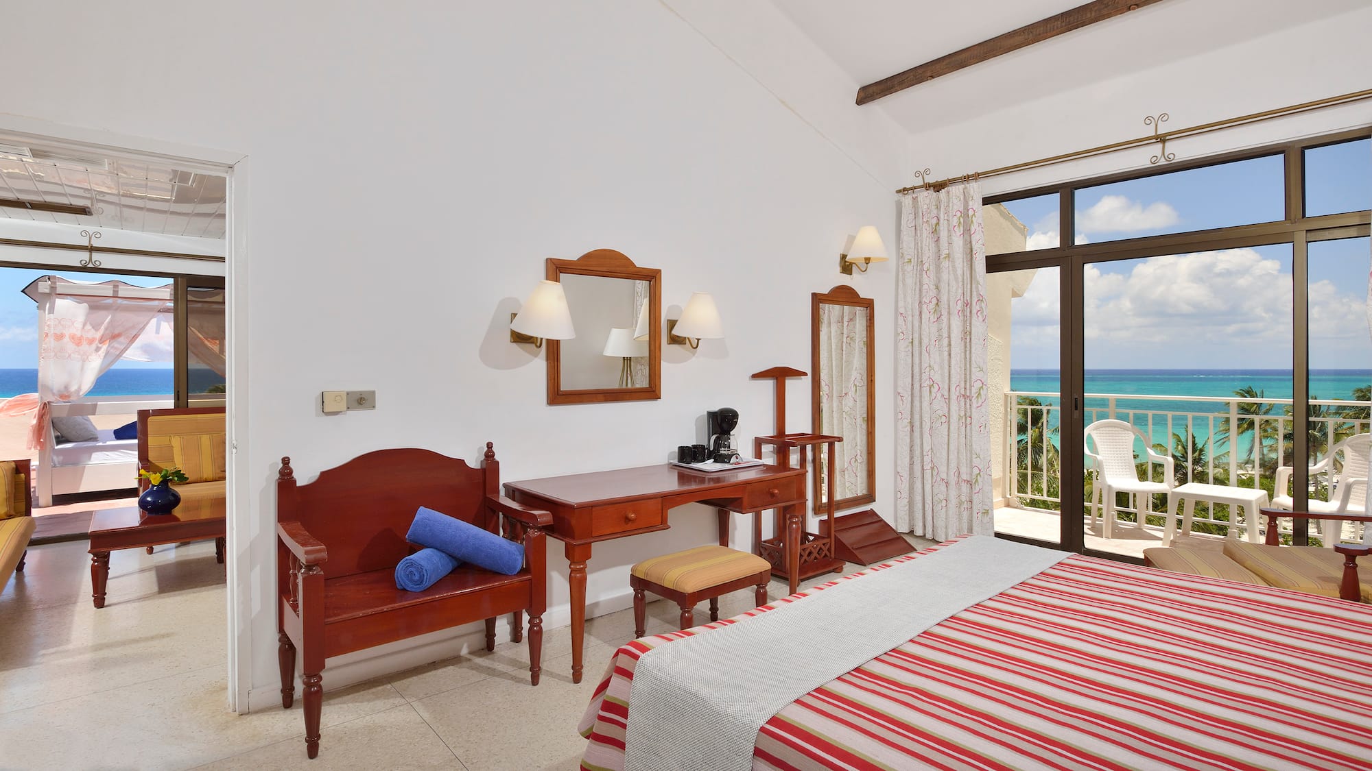 a room with a bed and a desk