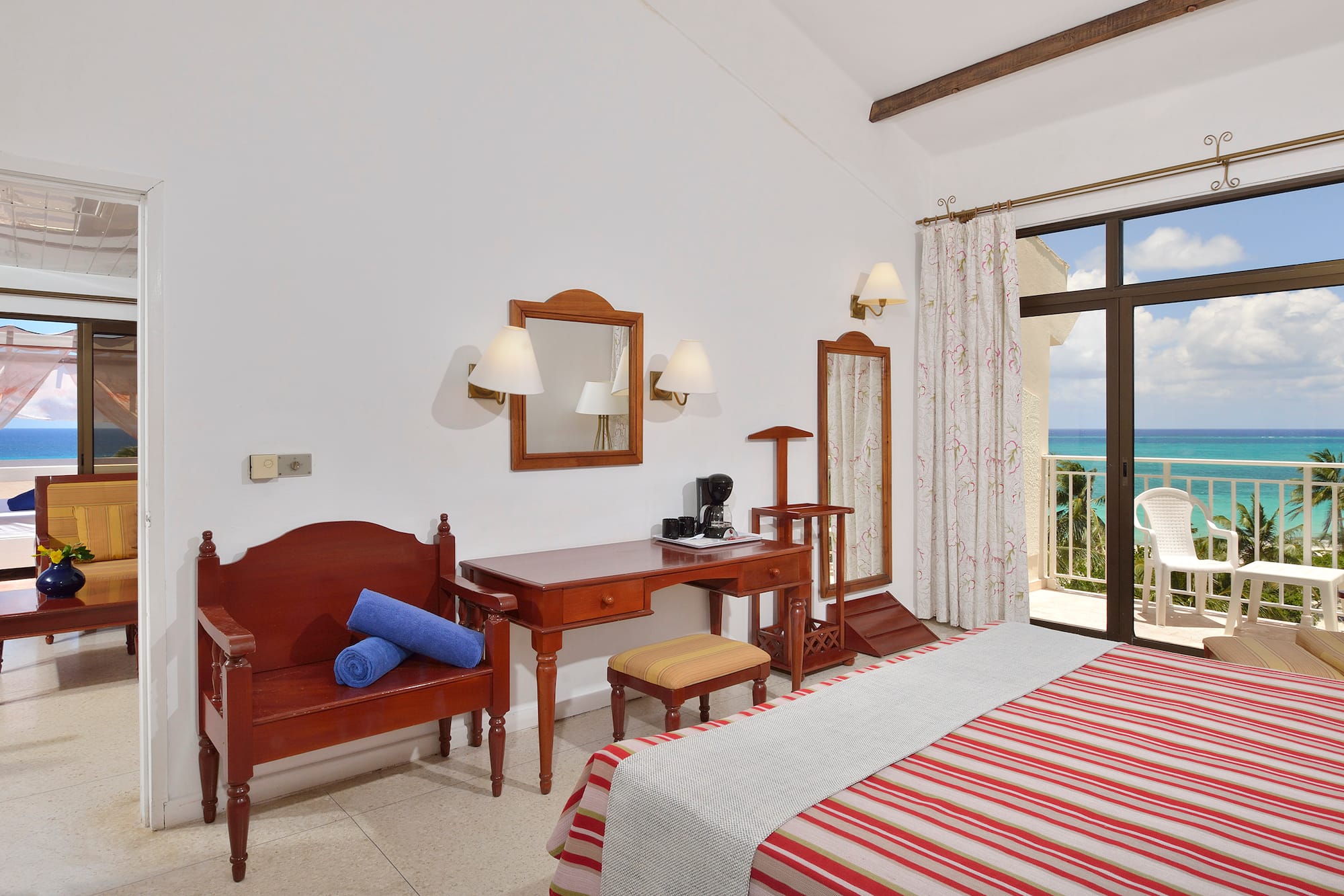 a room with a bed and a desk