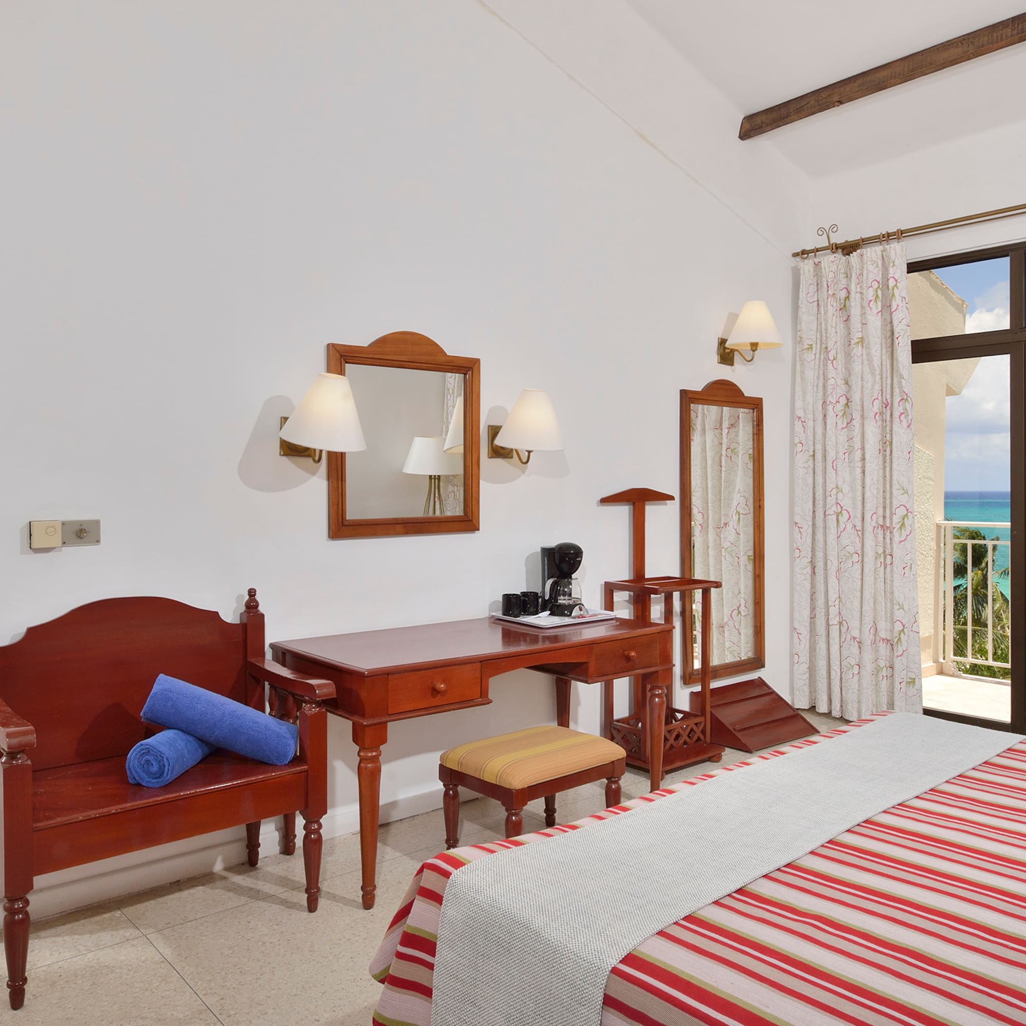 a room with a bed and a desk