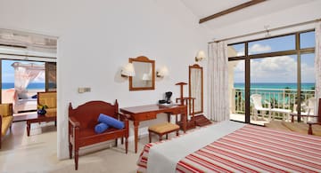 a room with a bed and a desk