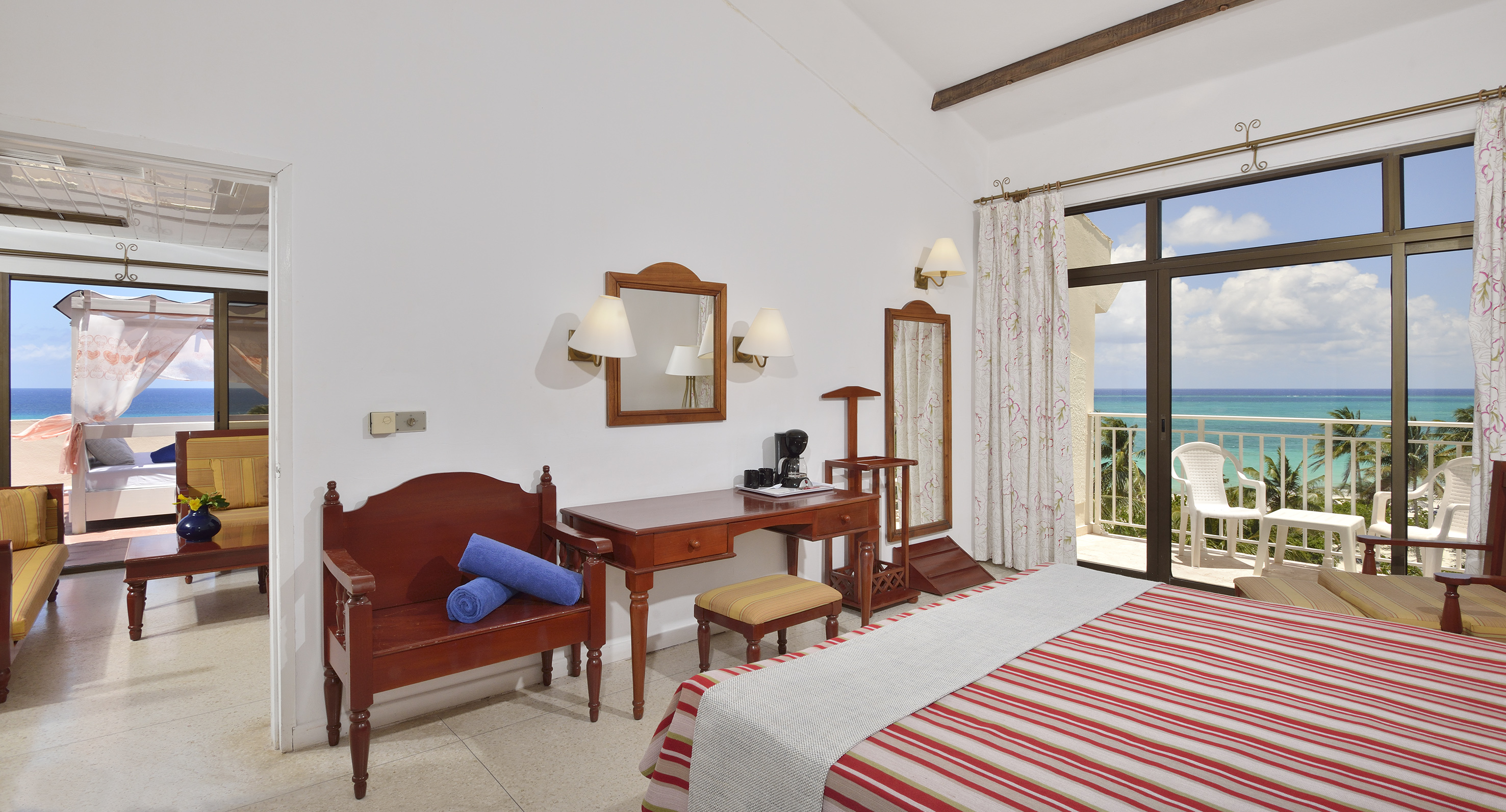 a room with a bed and a desk