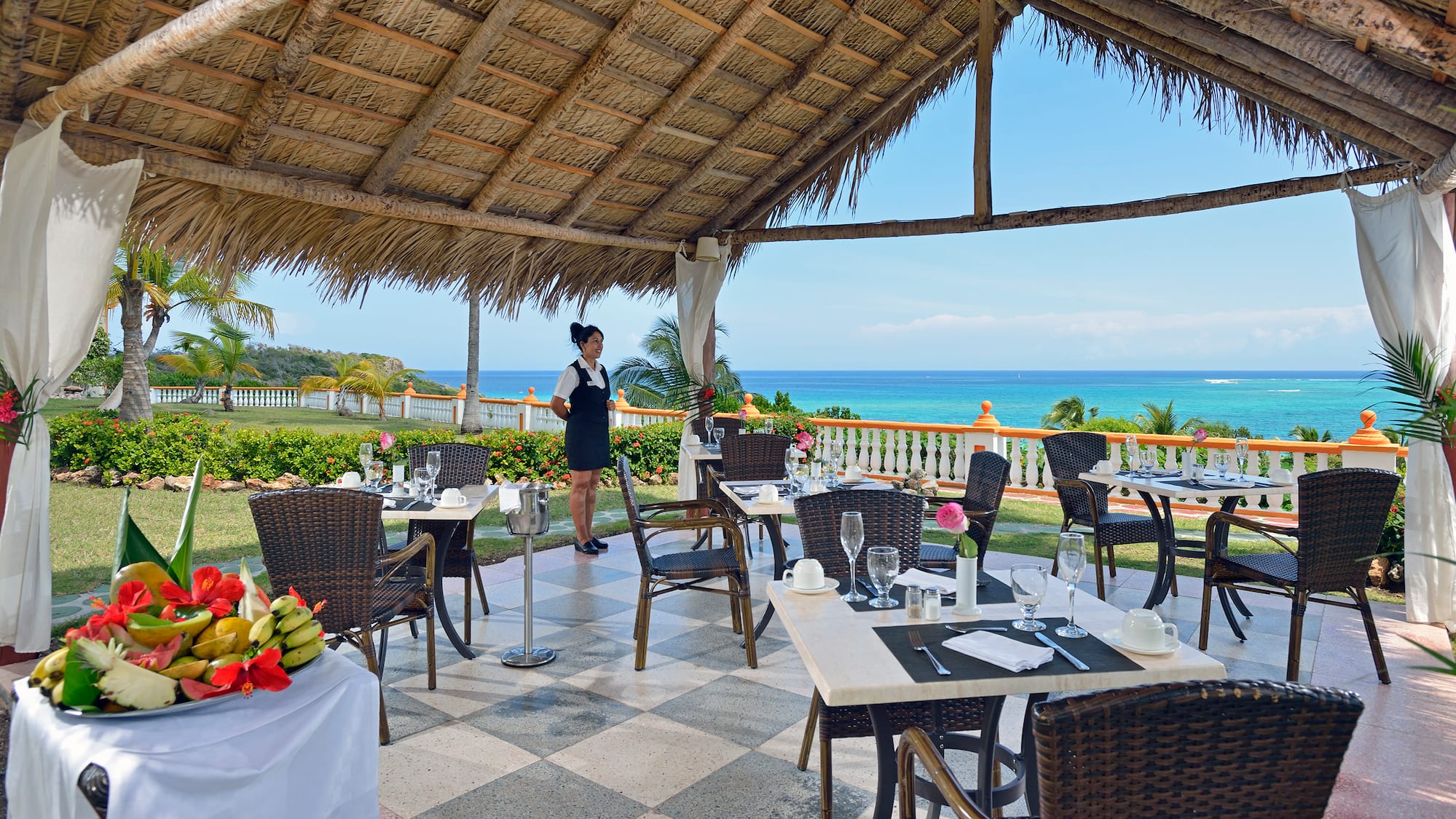 a woman standing in a restaurant
