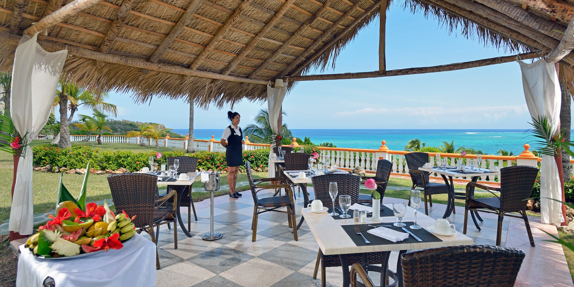 a woman standing in a restaurant