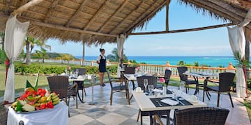 a woman standing in a restaurant