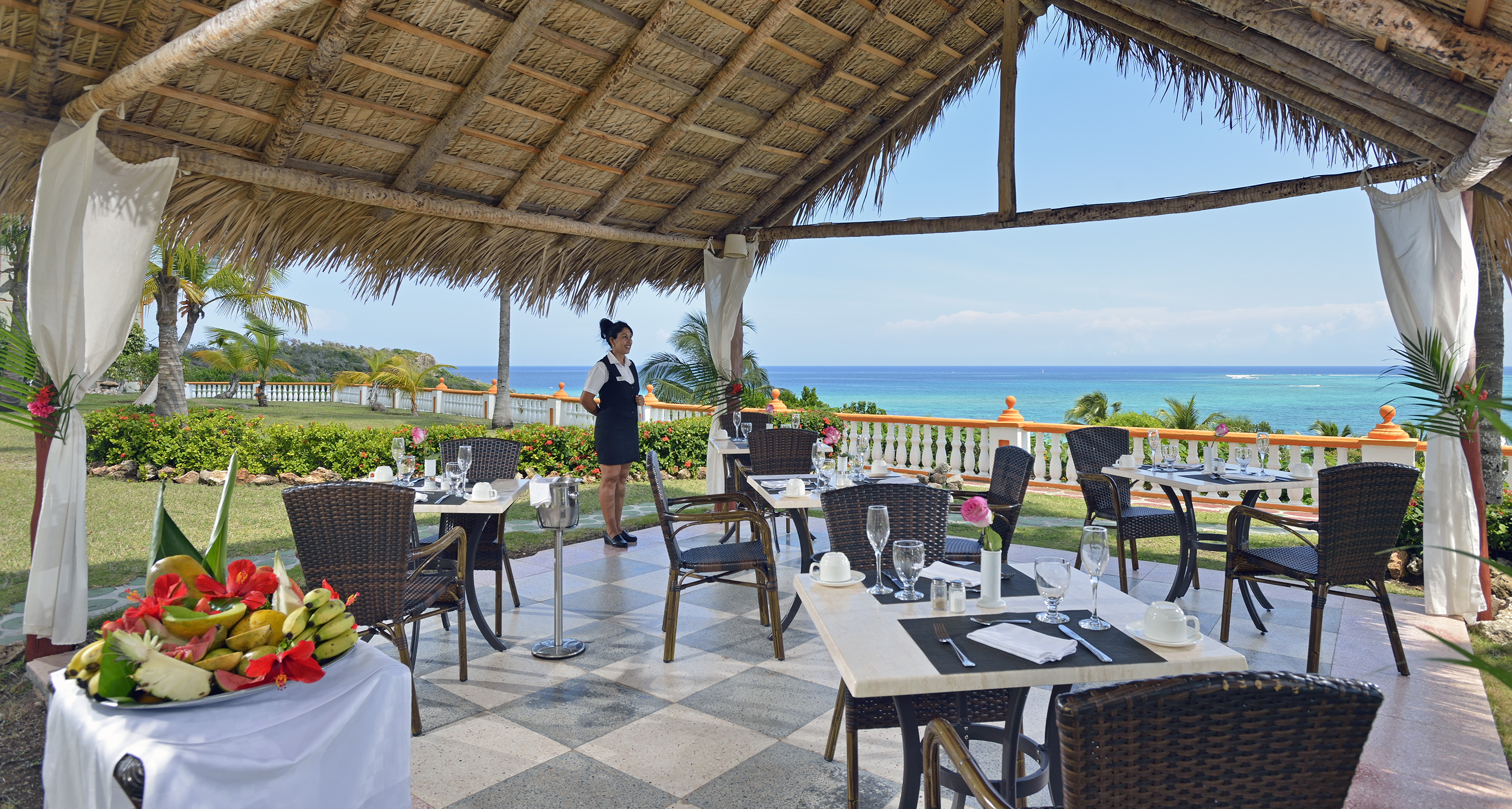 a woman standing in a restaurant