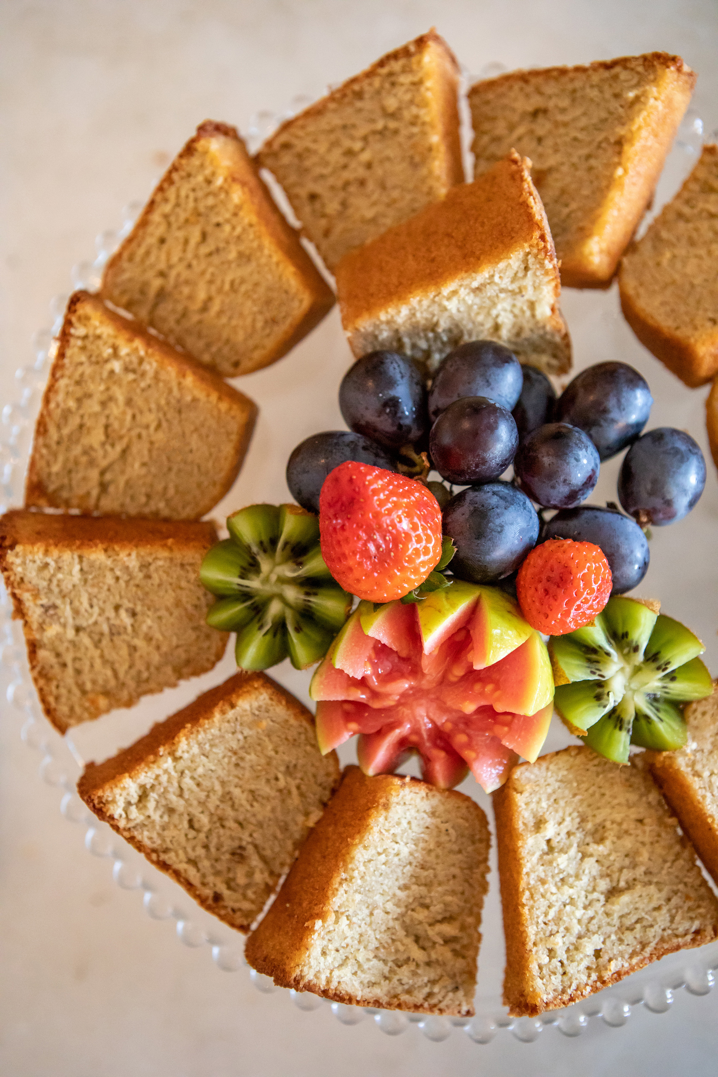 a plate of fruit and bread