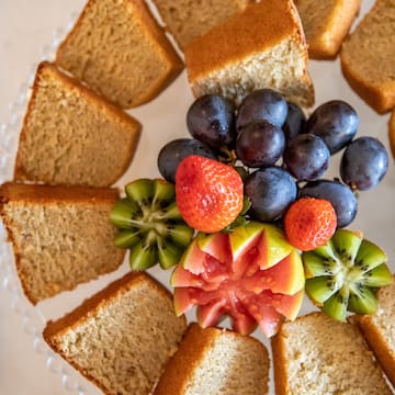 a plate of fruit and bread