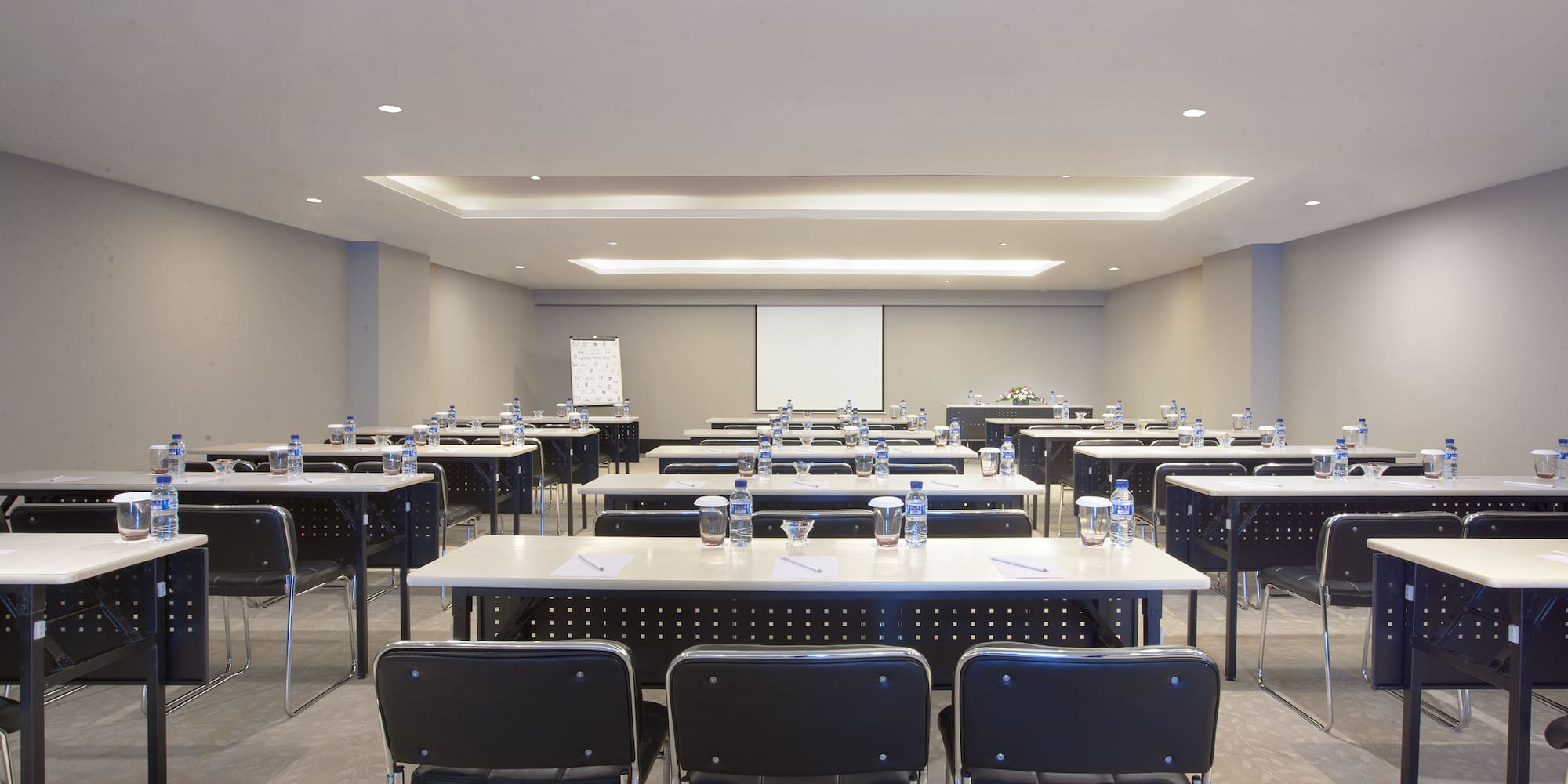 a room with tables and chairs