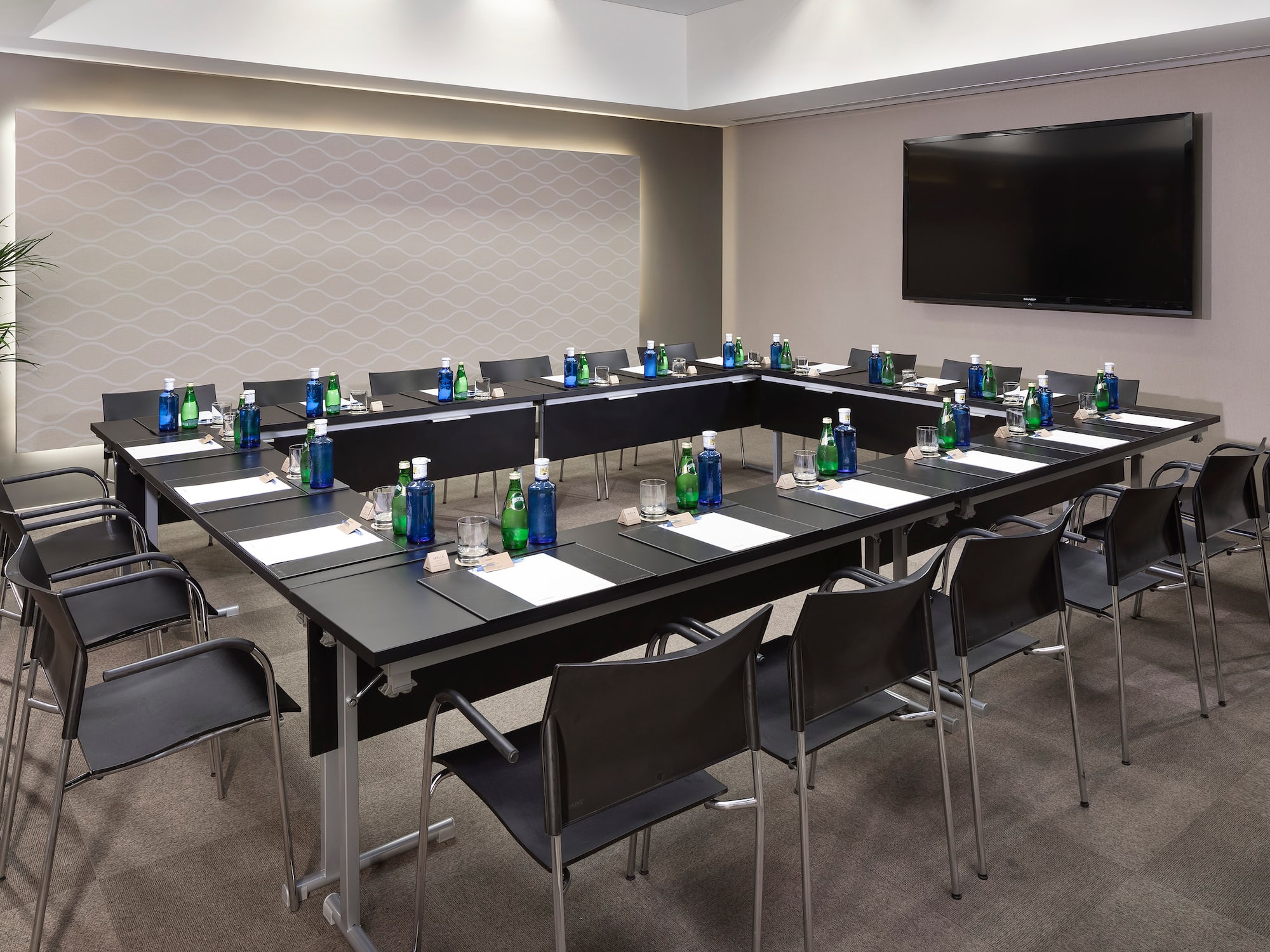 a room with tables and chairs