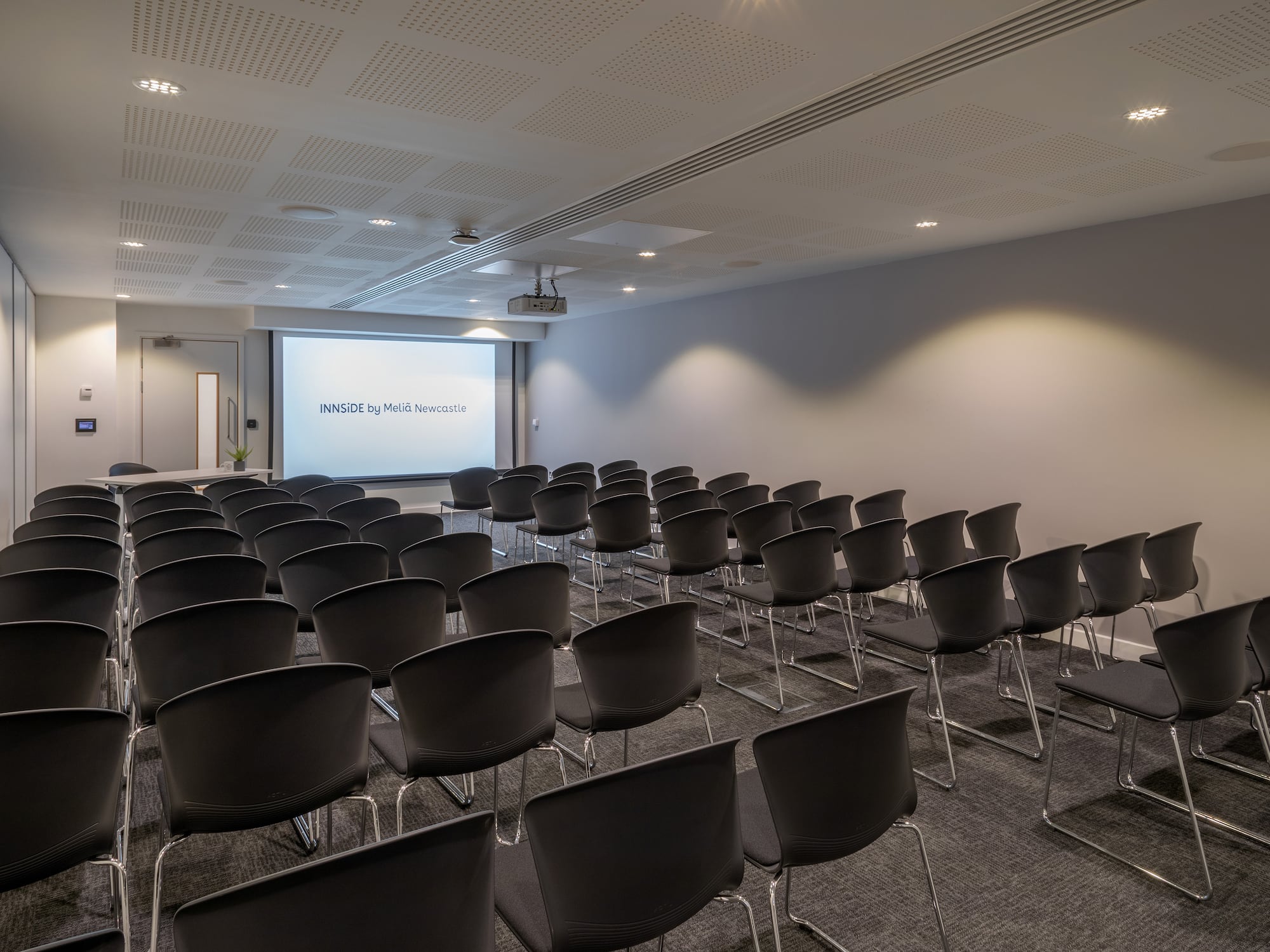 a room with rows of chairs