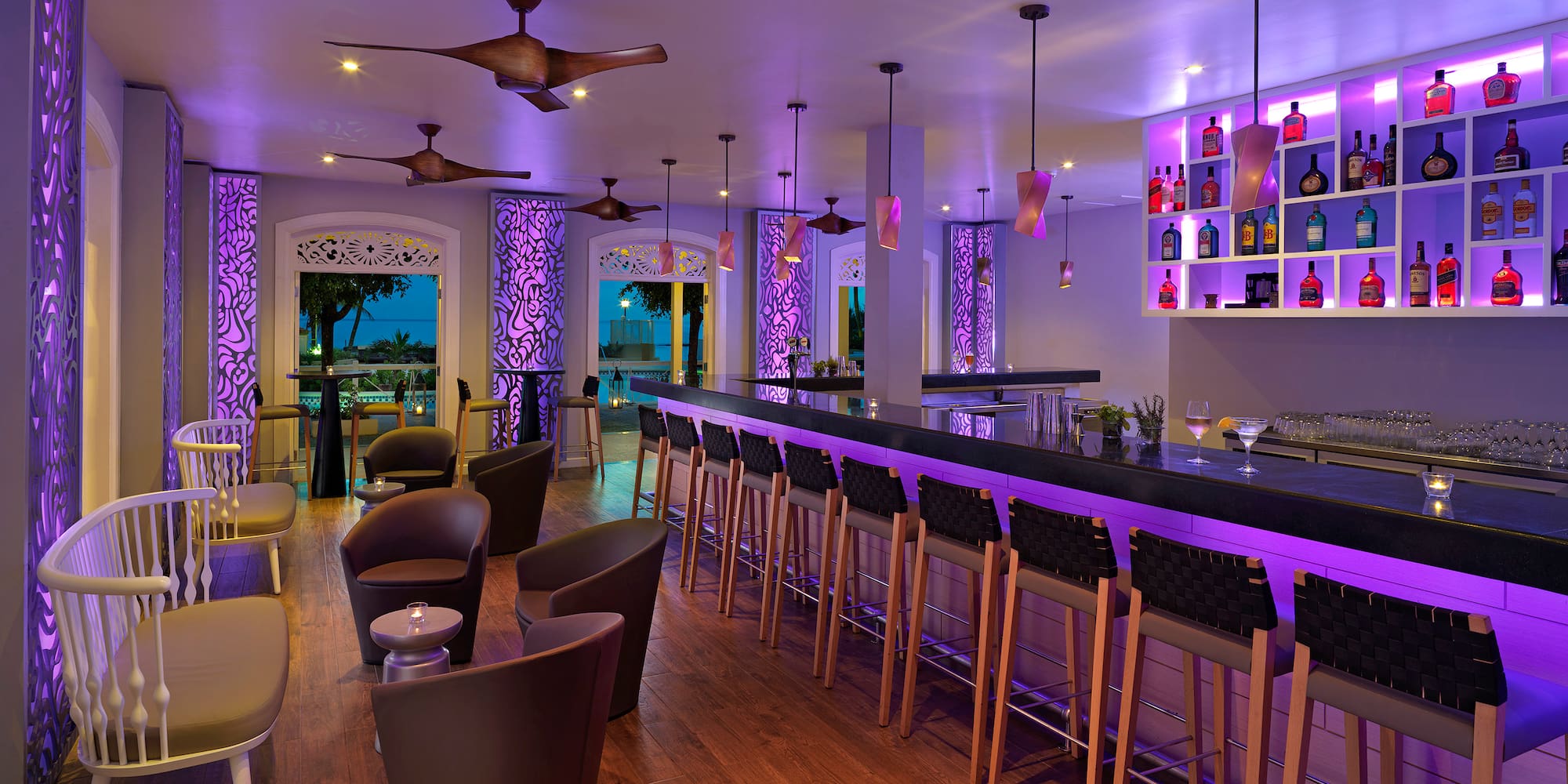 a bar with purple lights