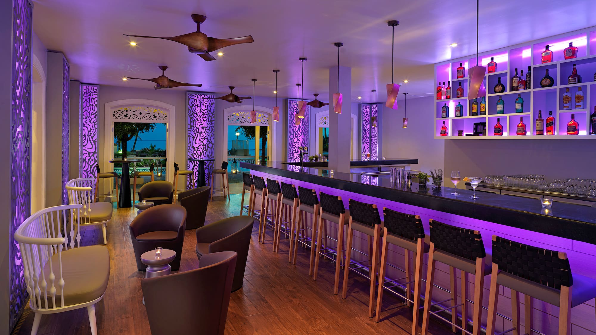 a bar with purple lights