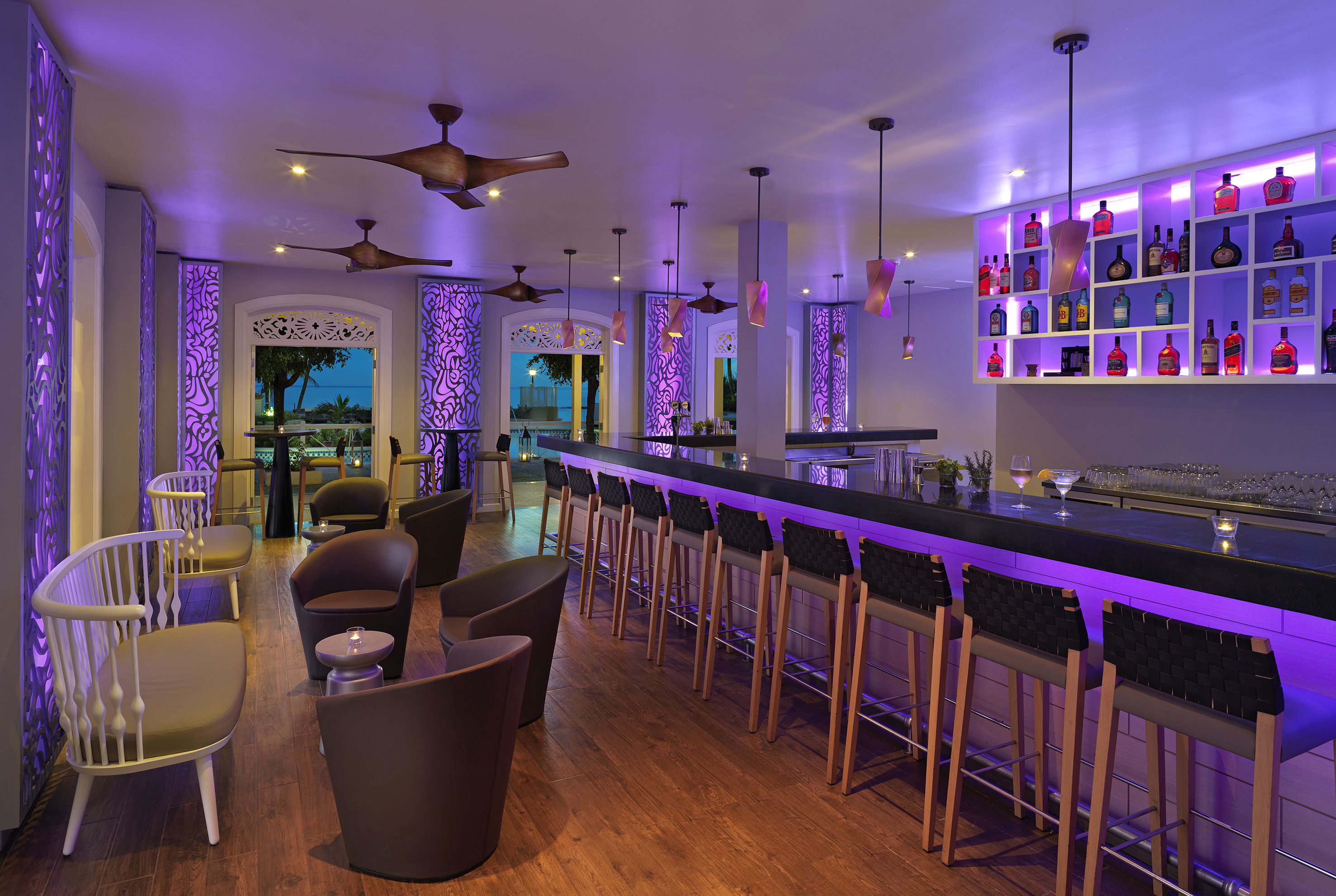 a bar with purple lights