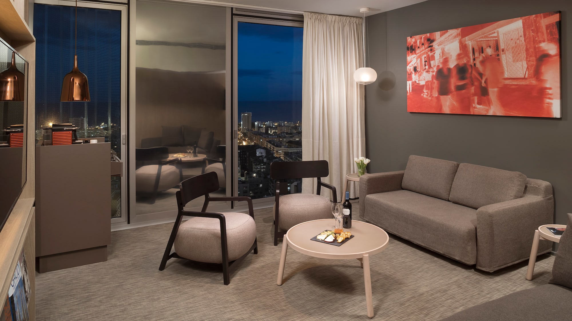 a living room with a couch and a table