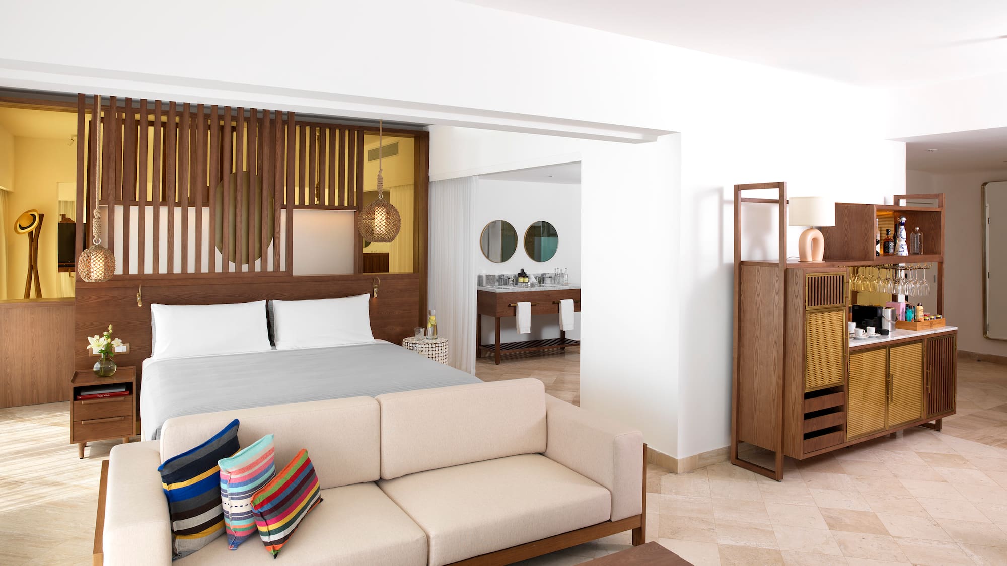 a bedroom with a bed and a couch