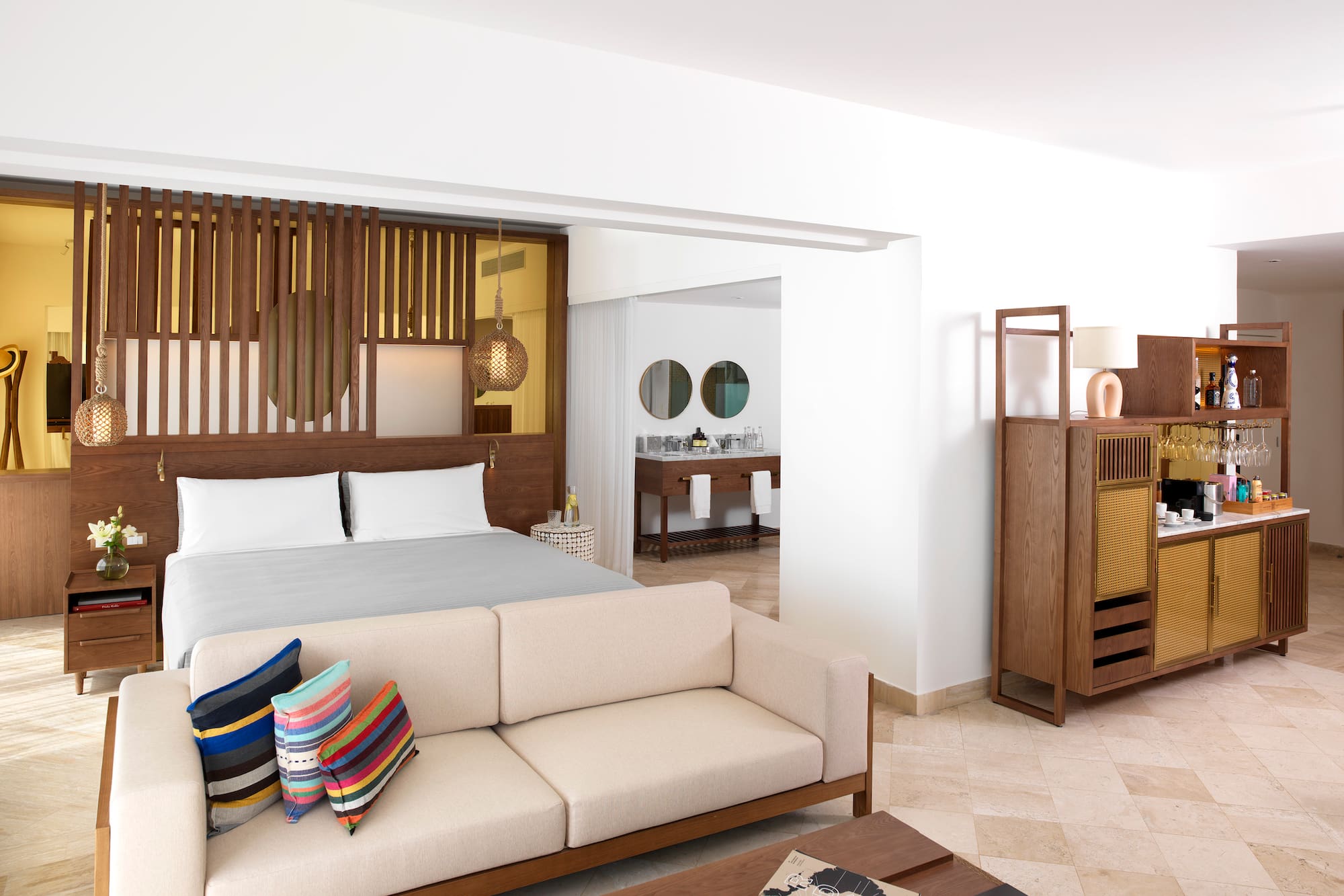 a bedroom with a bed and a couch