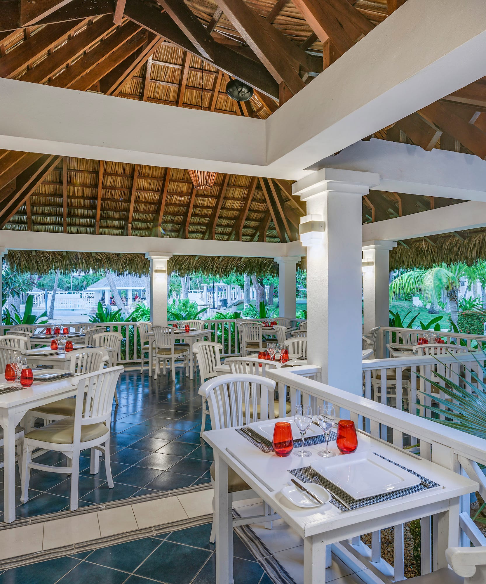 a restaurant with tables and chairs