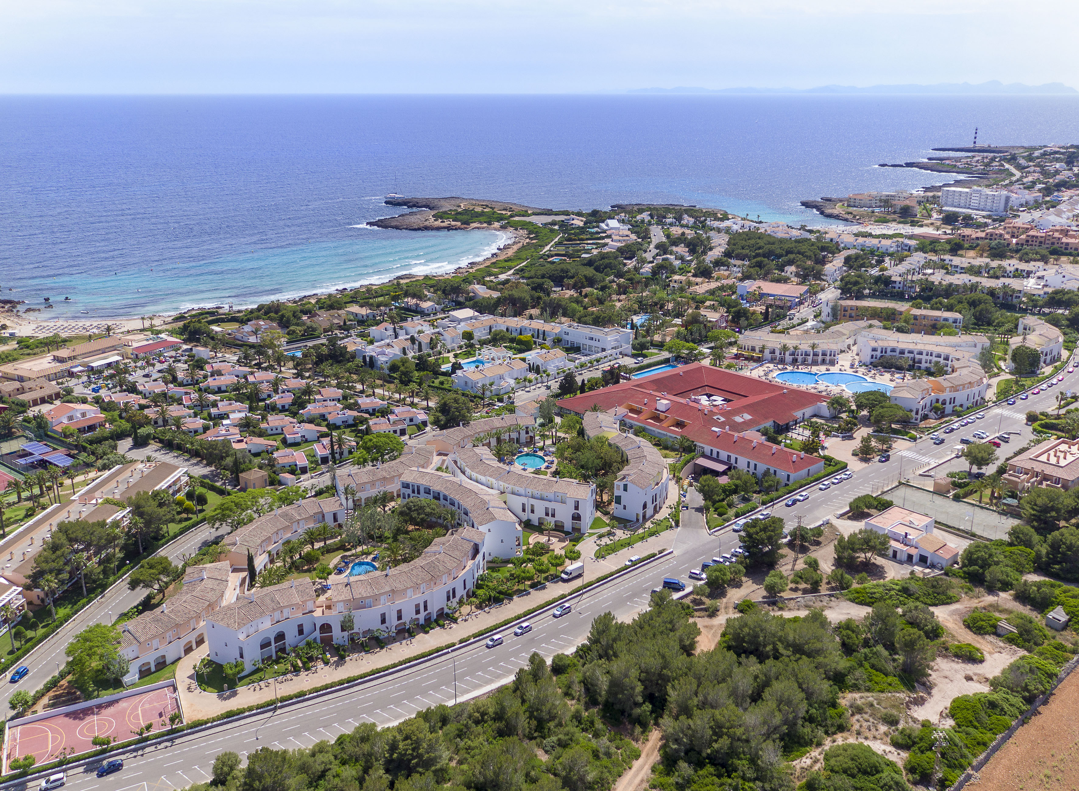 a aerial view of a town by the ocean