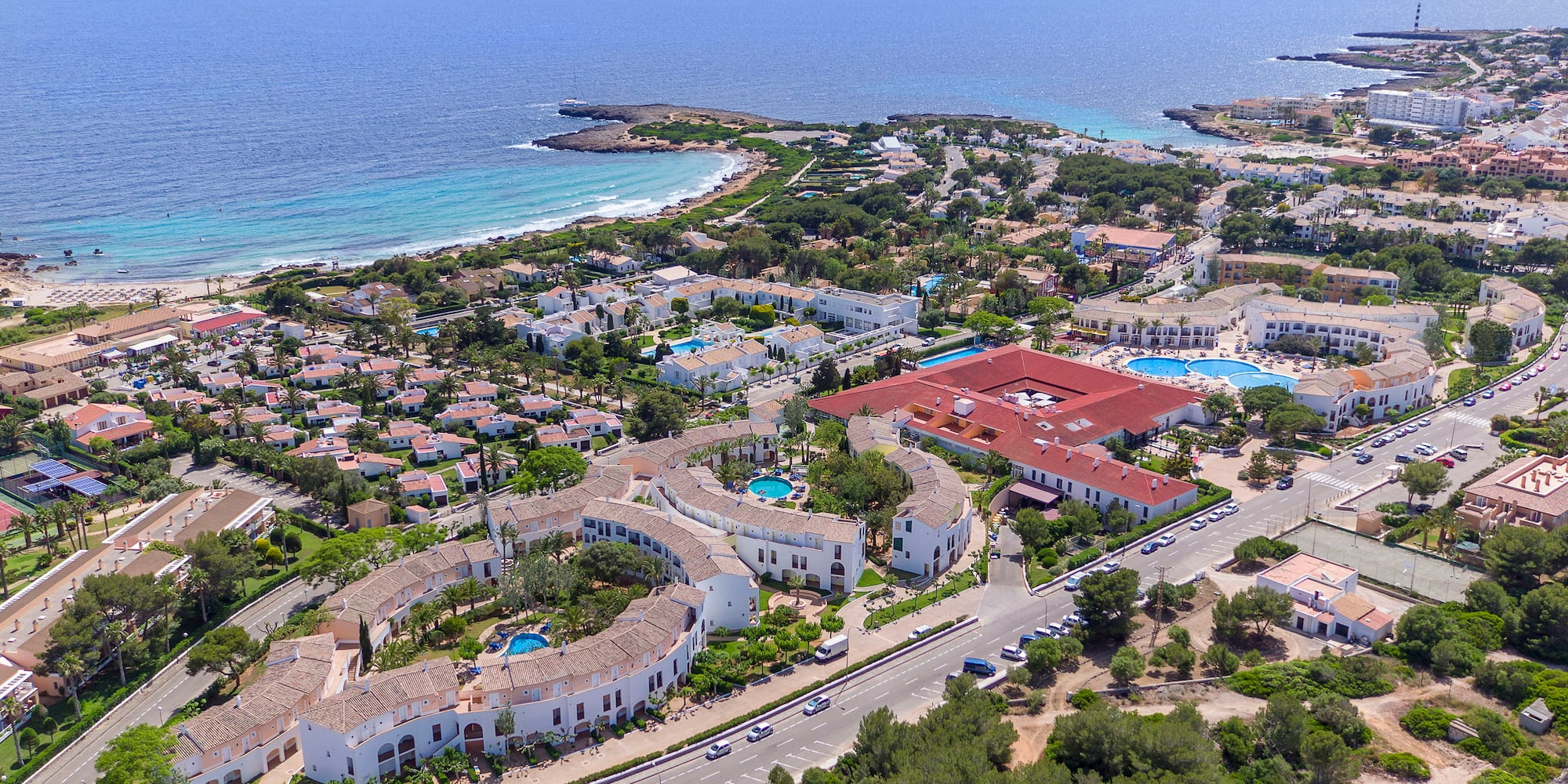 a aerial view of a town by the ocean