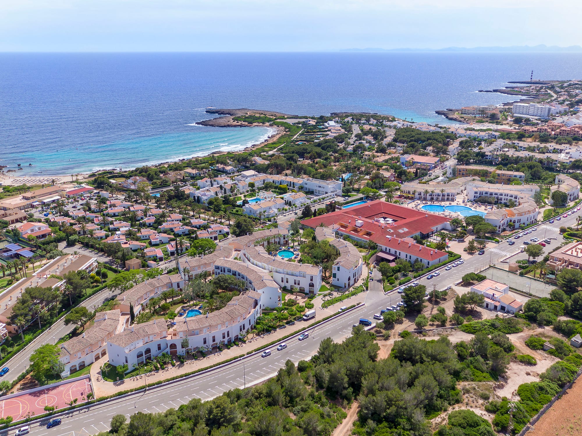 a aerial view of a town by the ocean