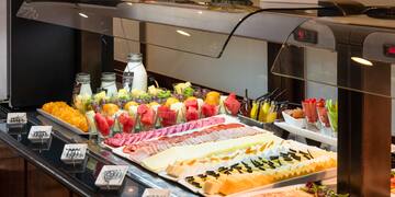 a buffet table with different types of food