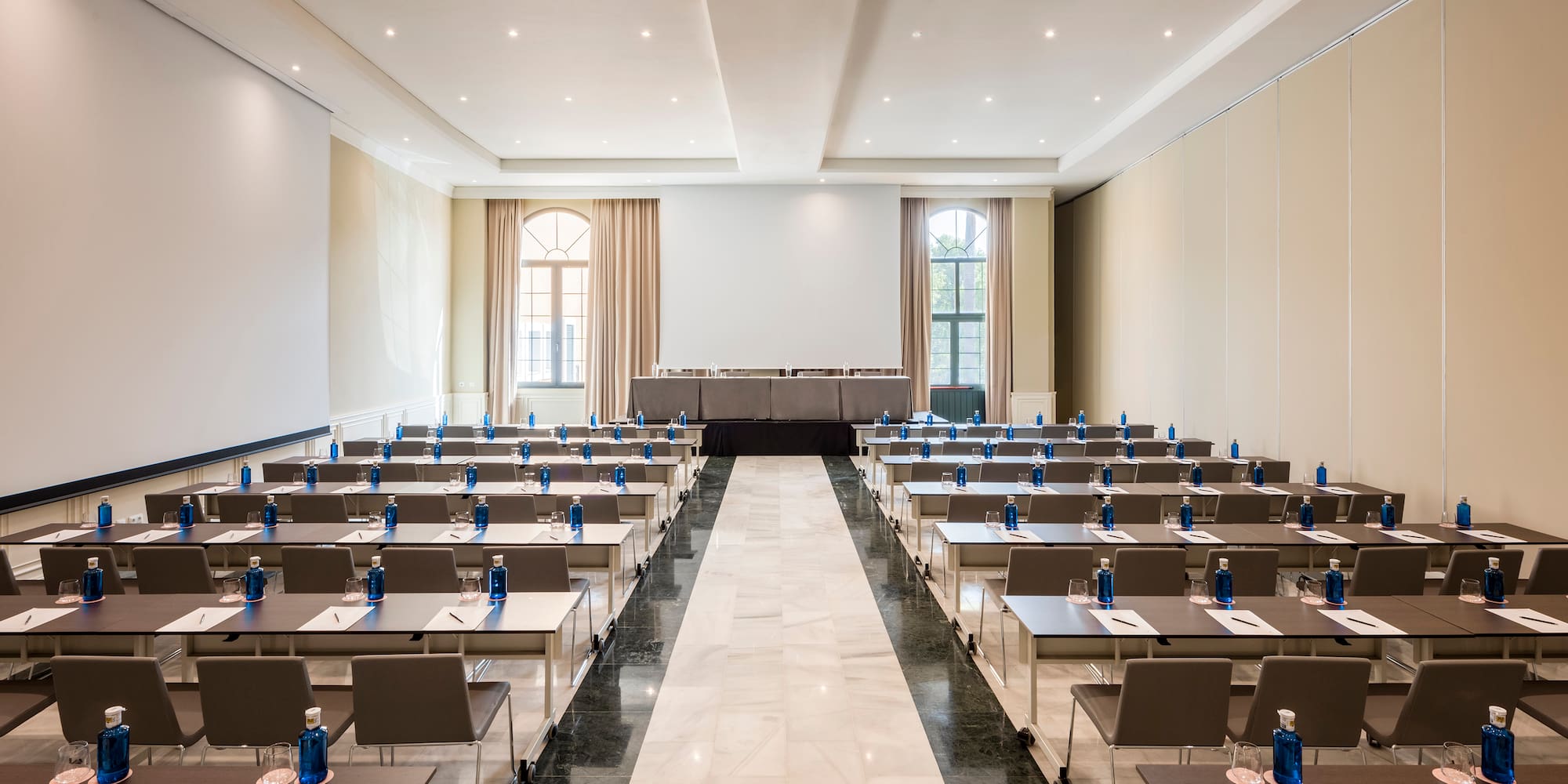 a room with tables and chairs