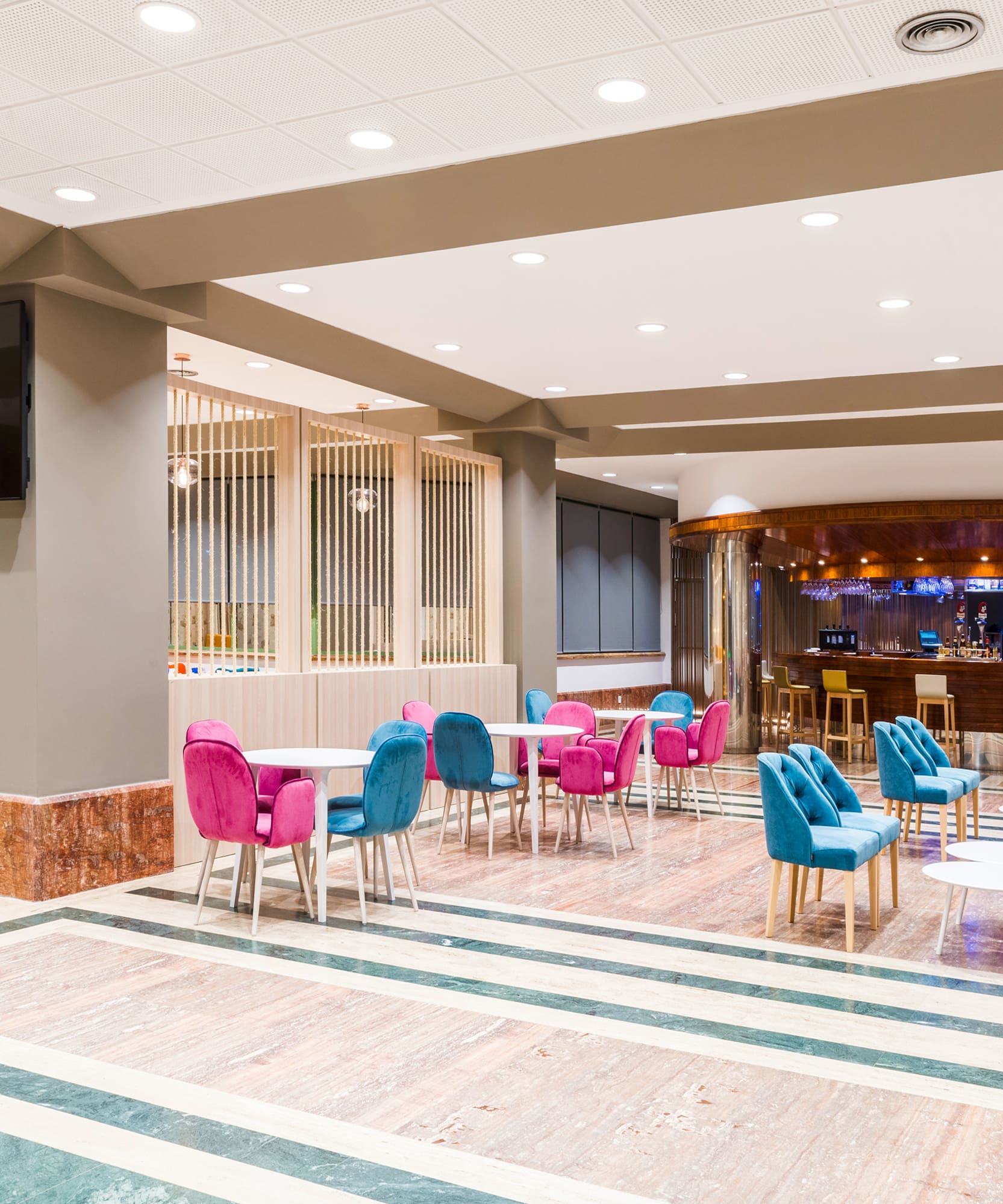 a room with tables and chairs