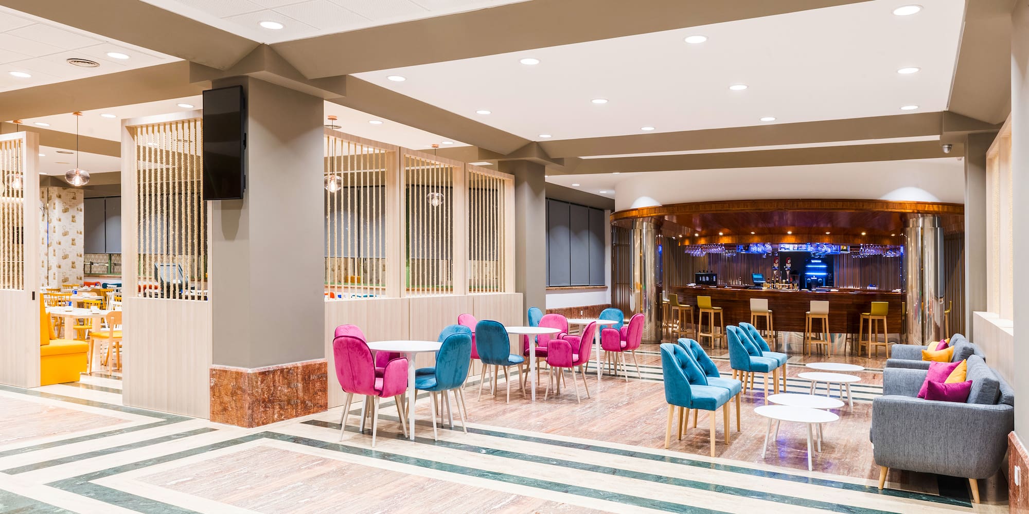 a room with tables and chairs