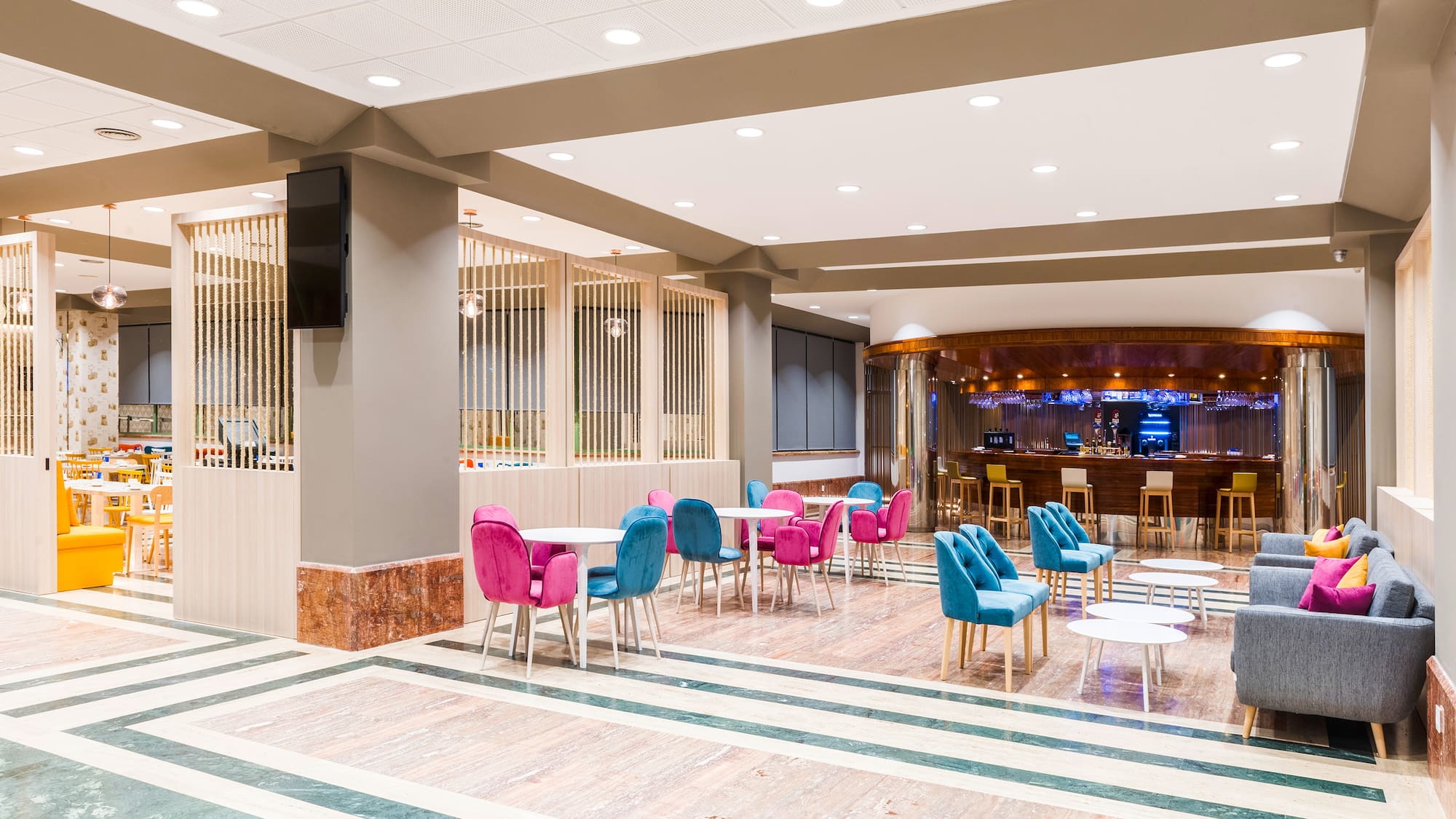 a room with tables and chairs