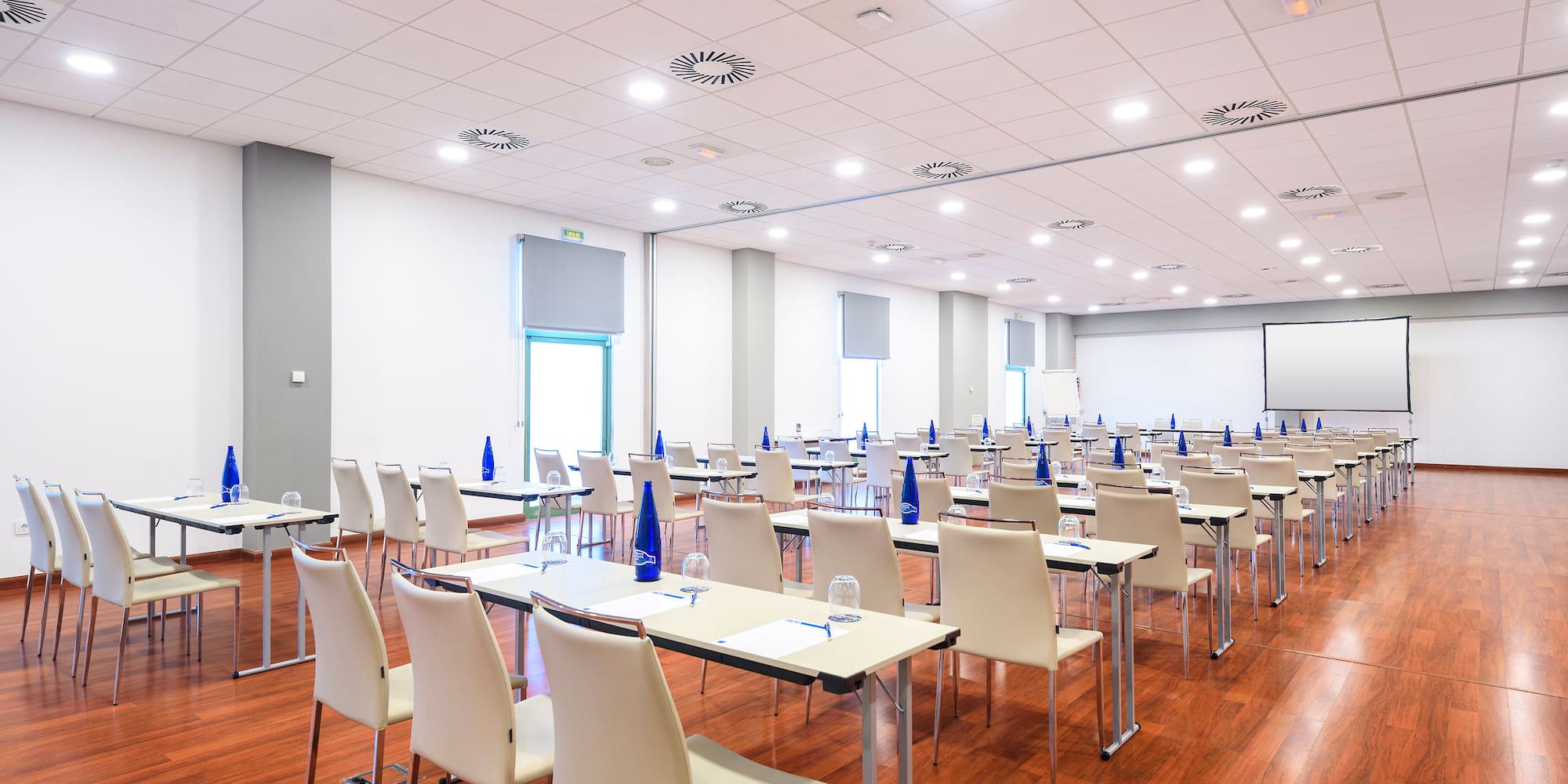 a room with tables and chairs