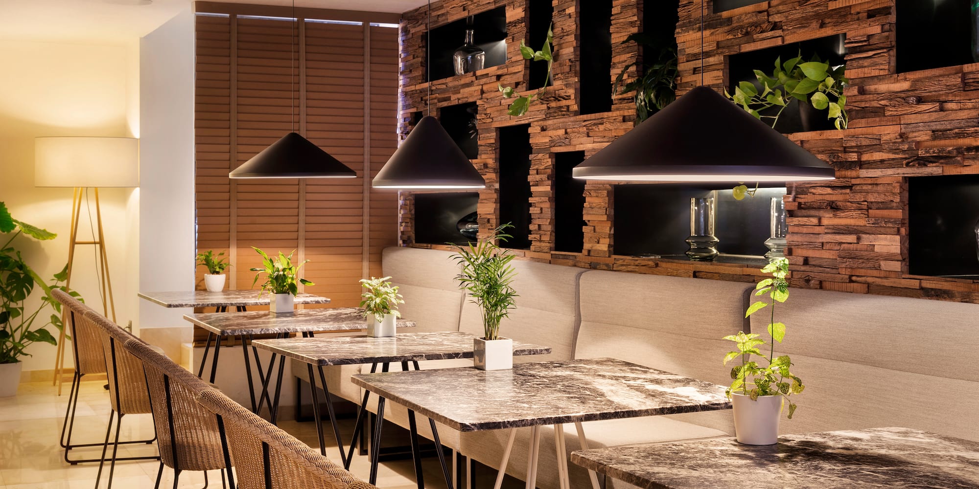 a room with tables and chairs