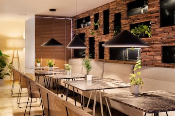a room with tables and chairs