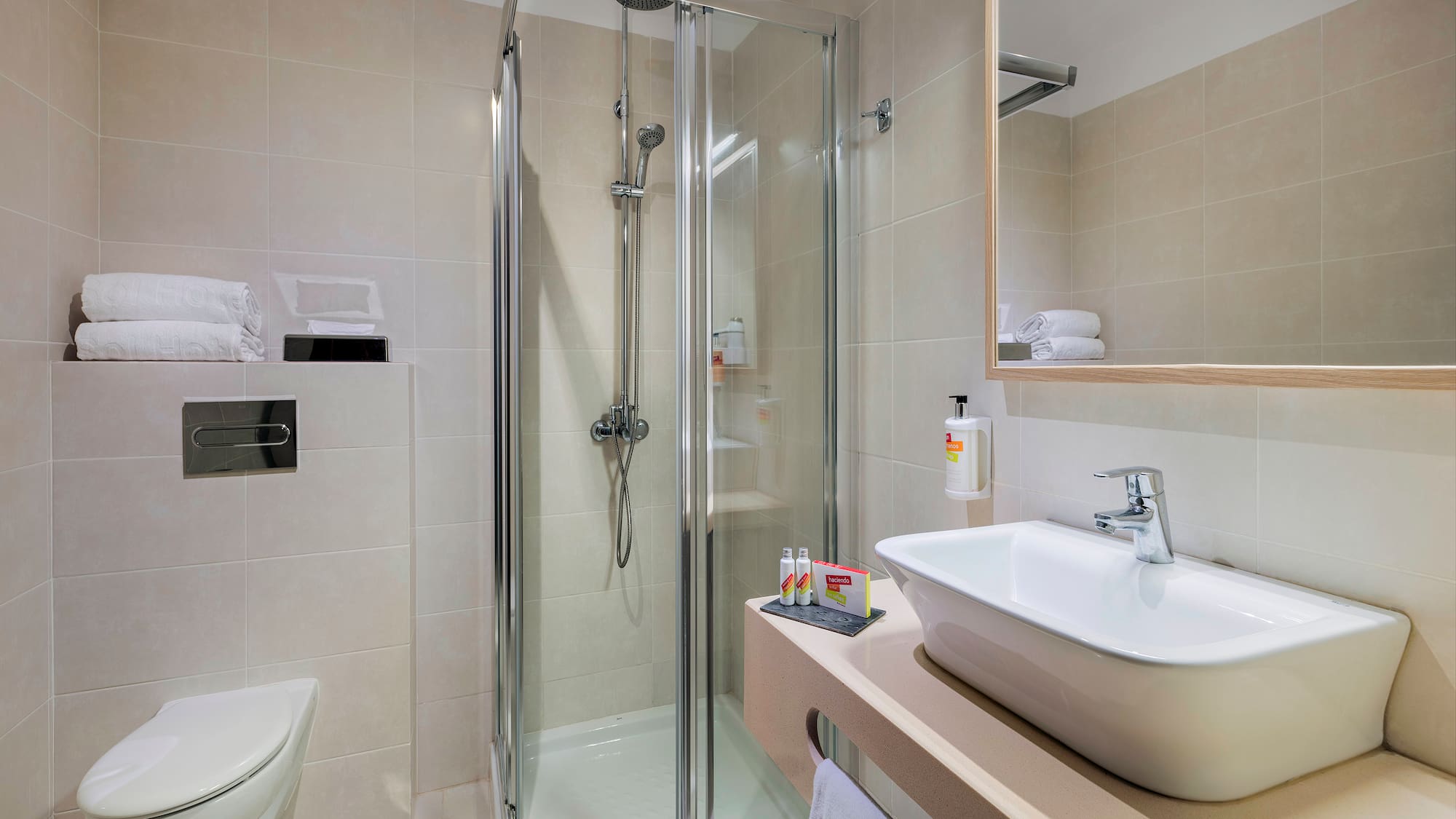 a bathroom with a shower and sink