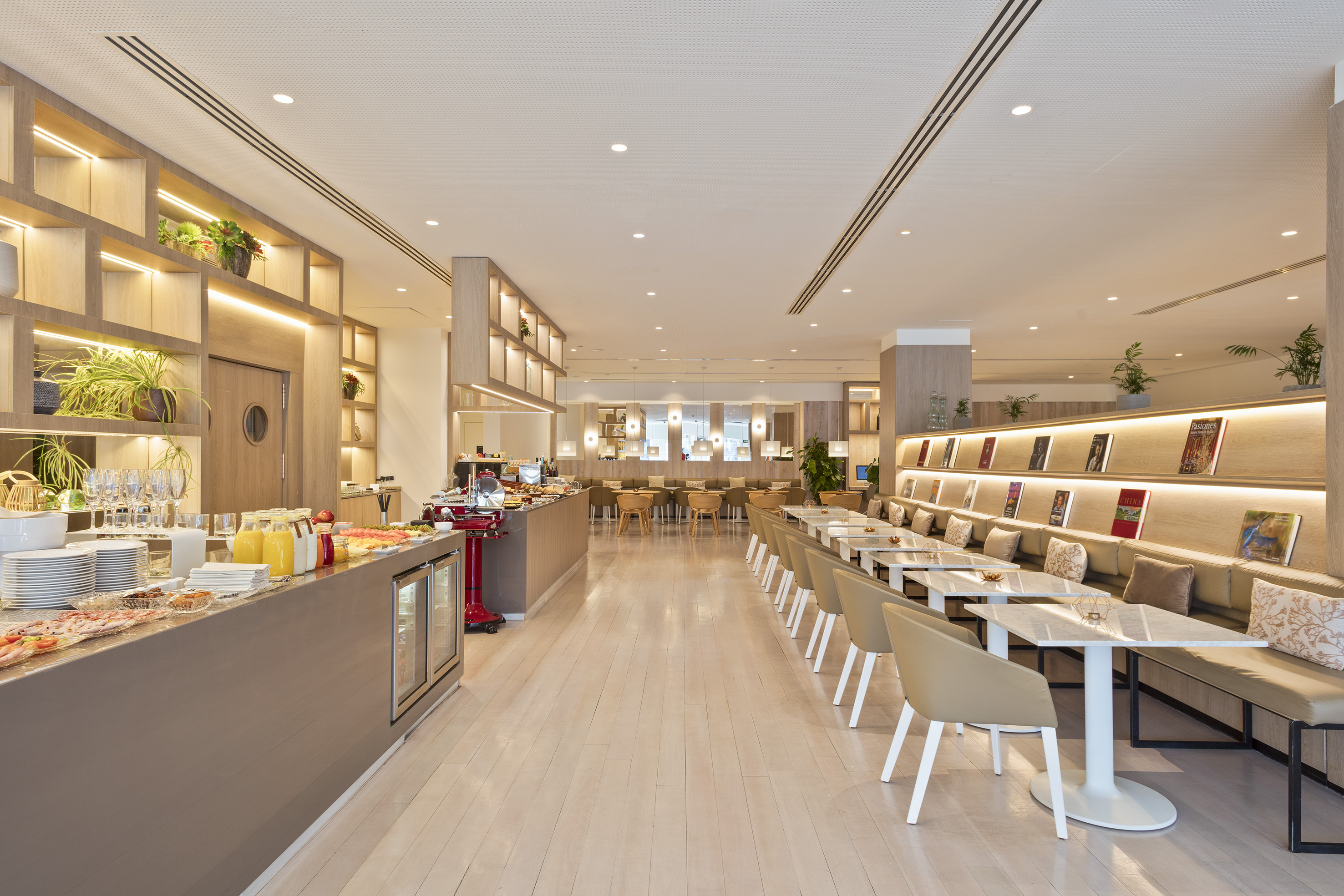 a restaurant with tables and chairs