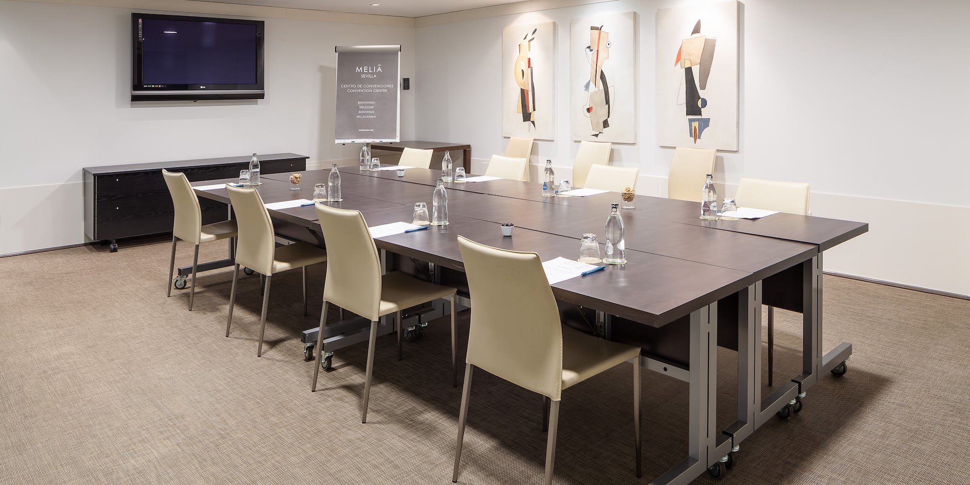 a room with a table and chairs