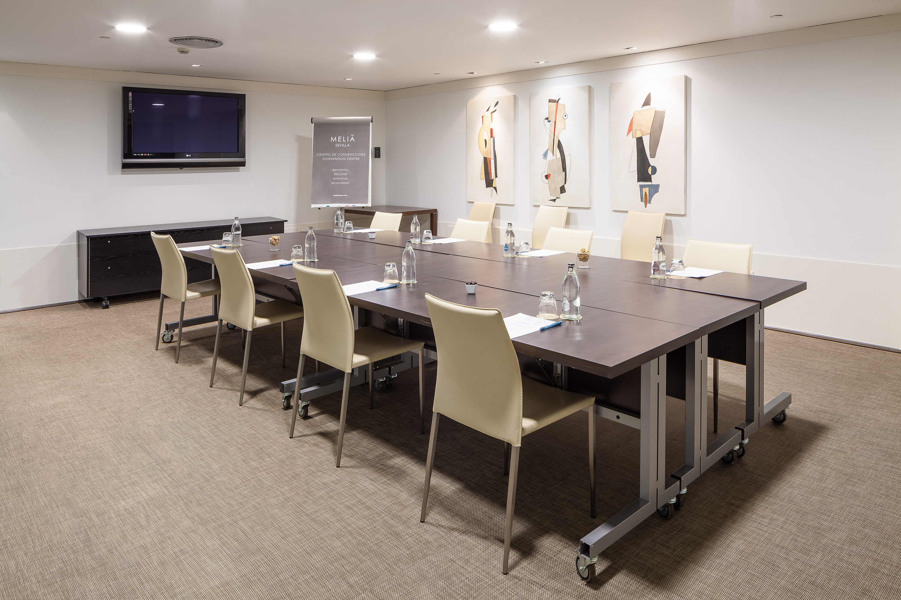 a room with a table and chairs