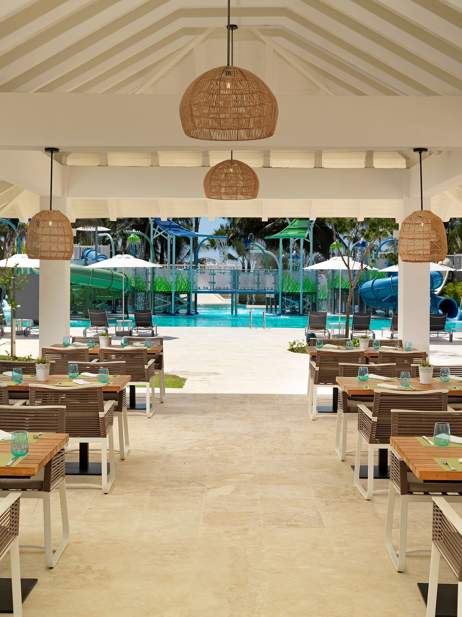 a restaurant with tables and chairs